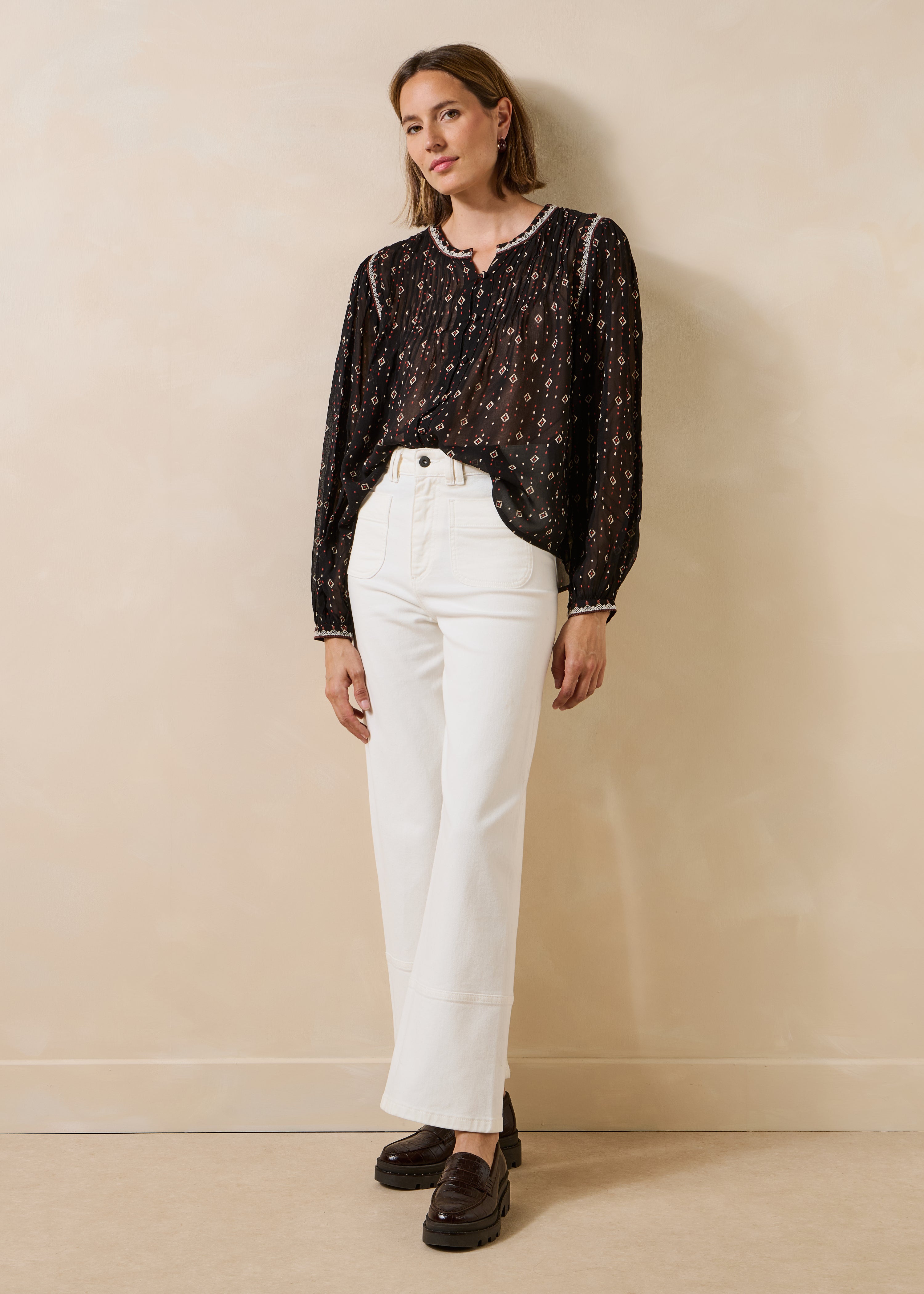 Schwarze Bluse mit langen Ärmeln und Print