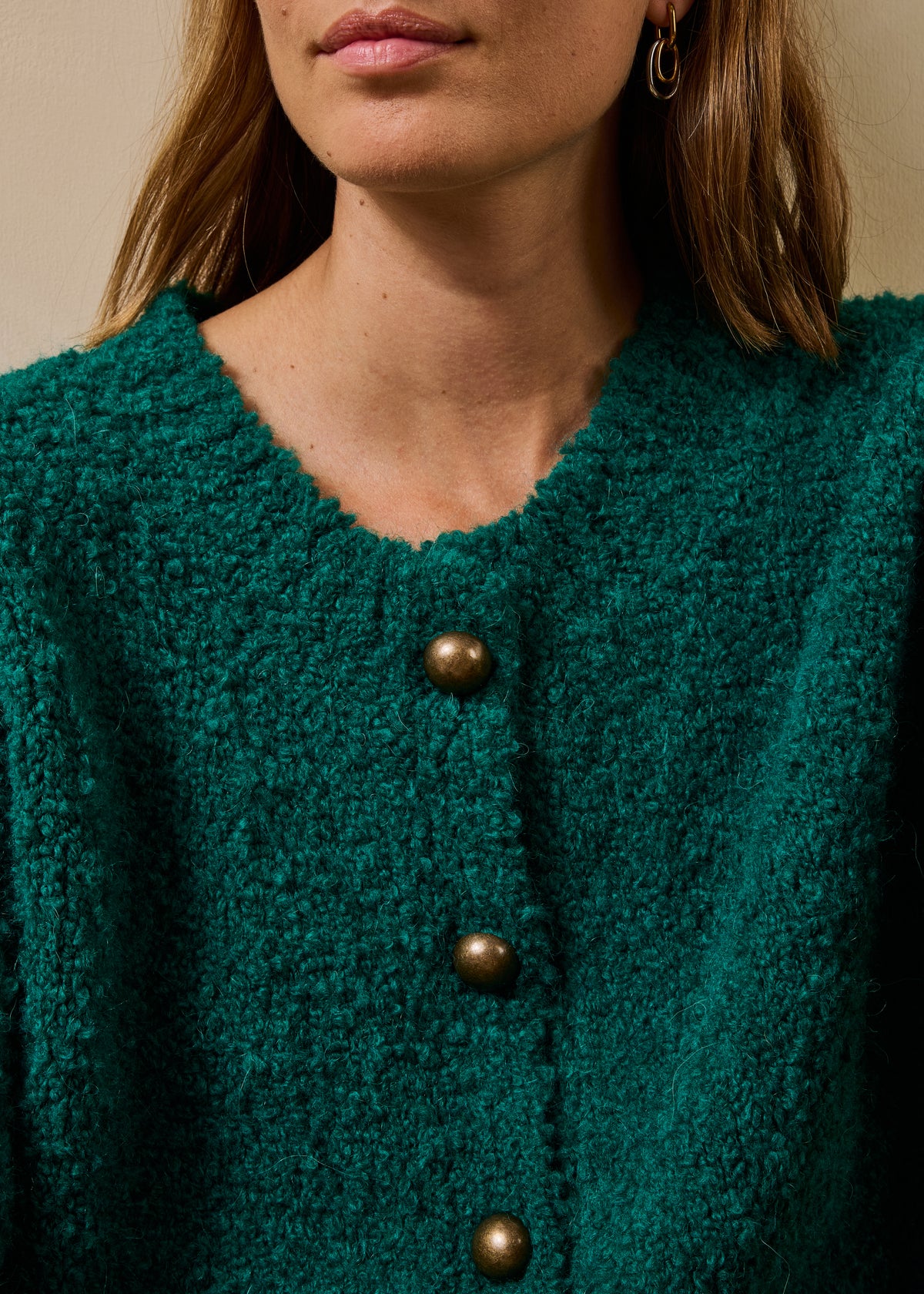 Chaleco verde de punto bouclé con cuello redondo