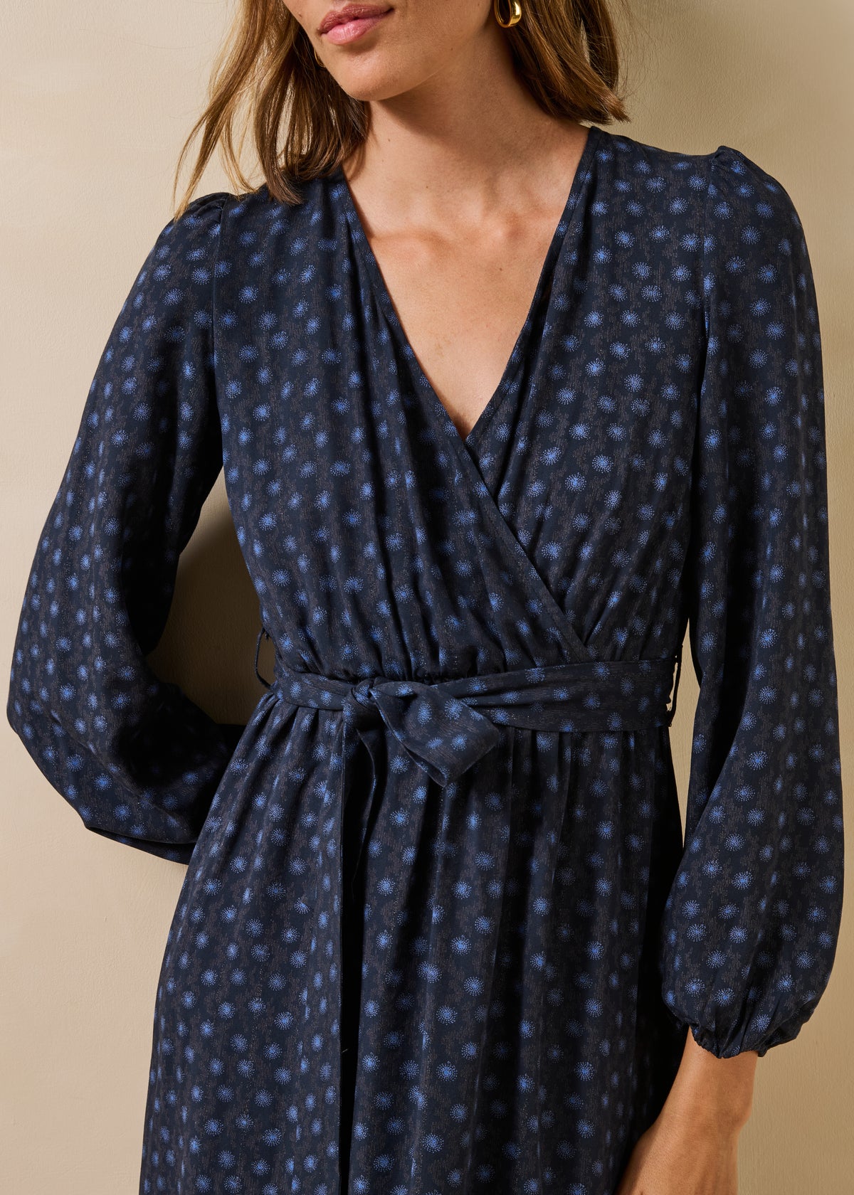 Long blue long-sleeved wrap dress with print