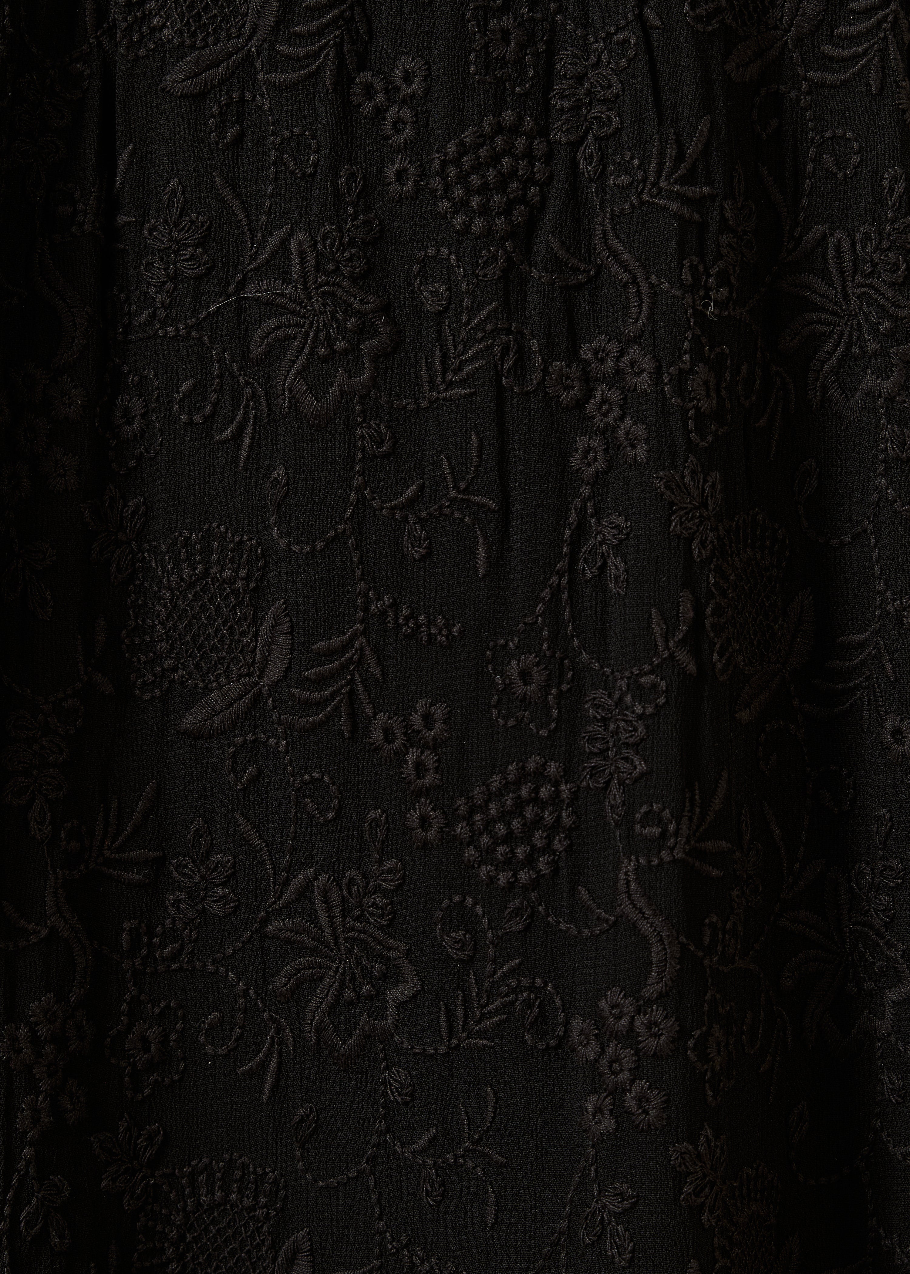 Black embroidered short dress with long sleeves