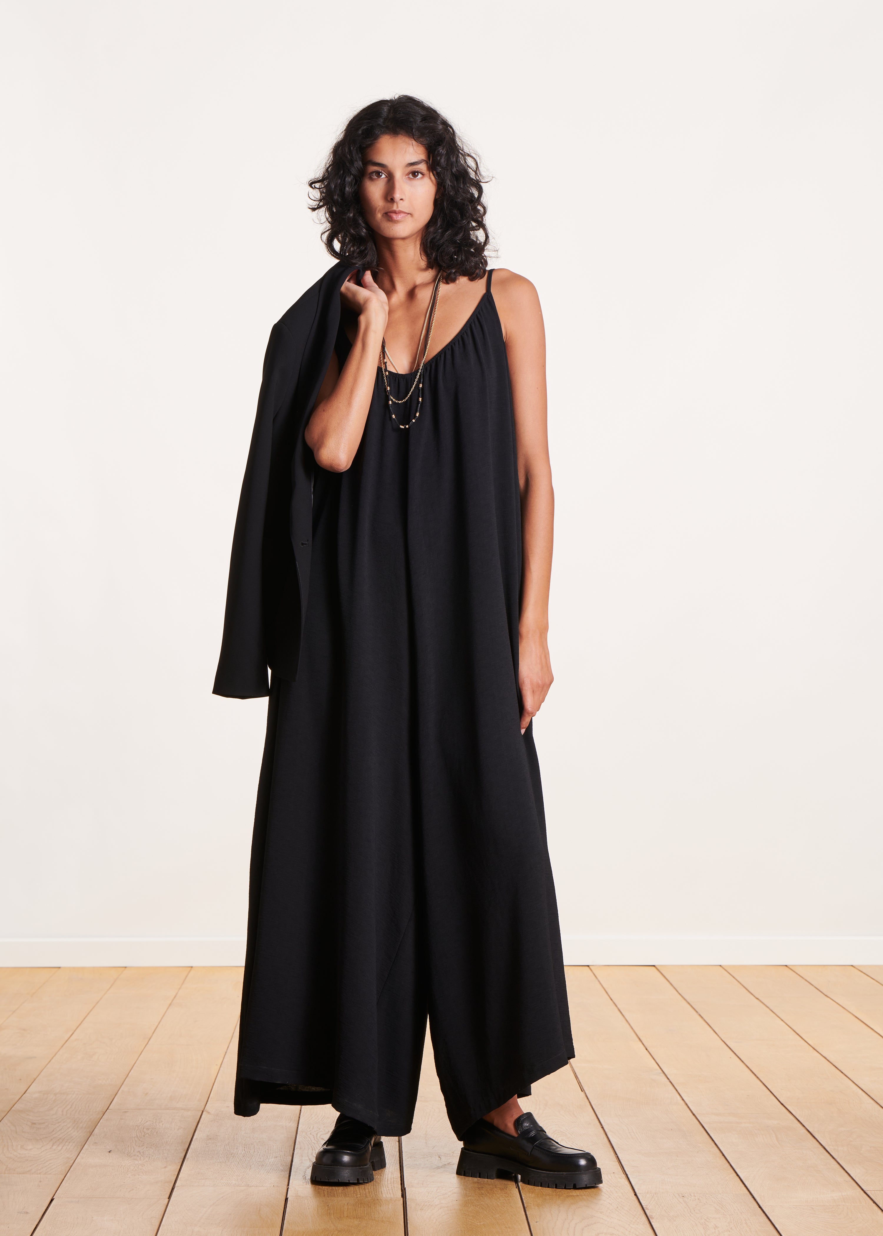 Loose black strappy jumpsuit