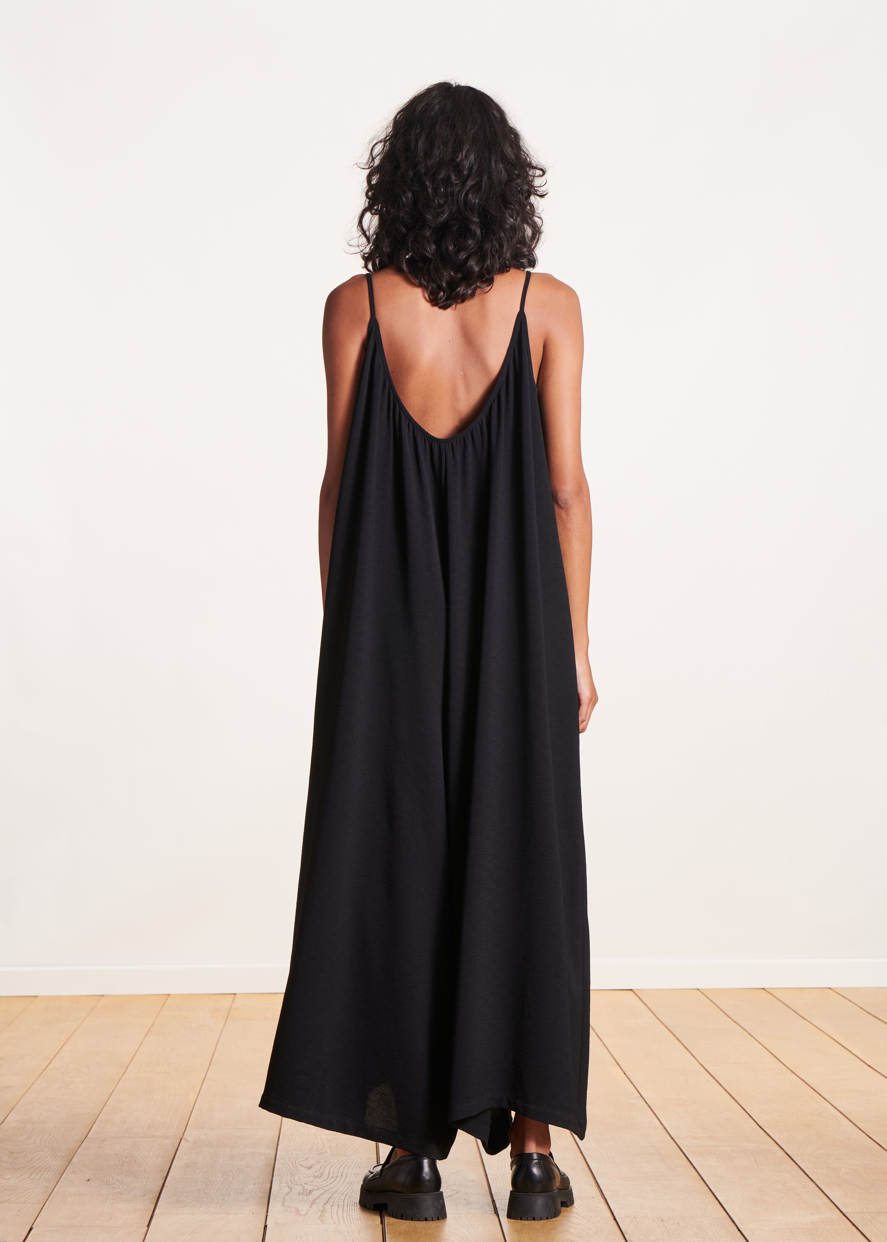 Loose black strappy jumpsuit