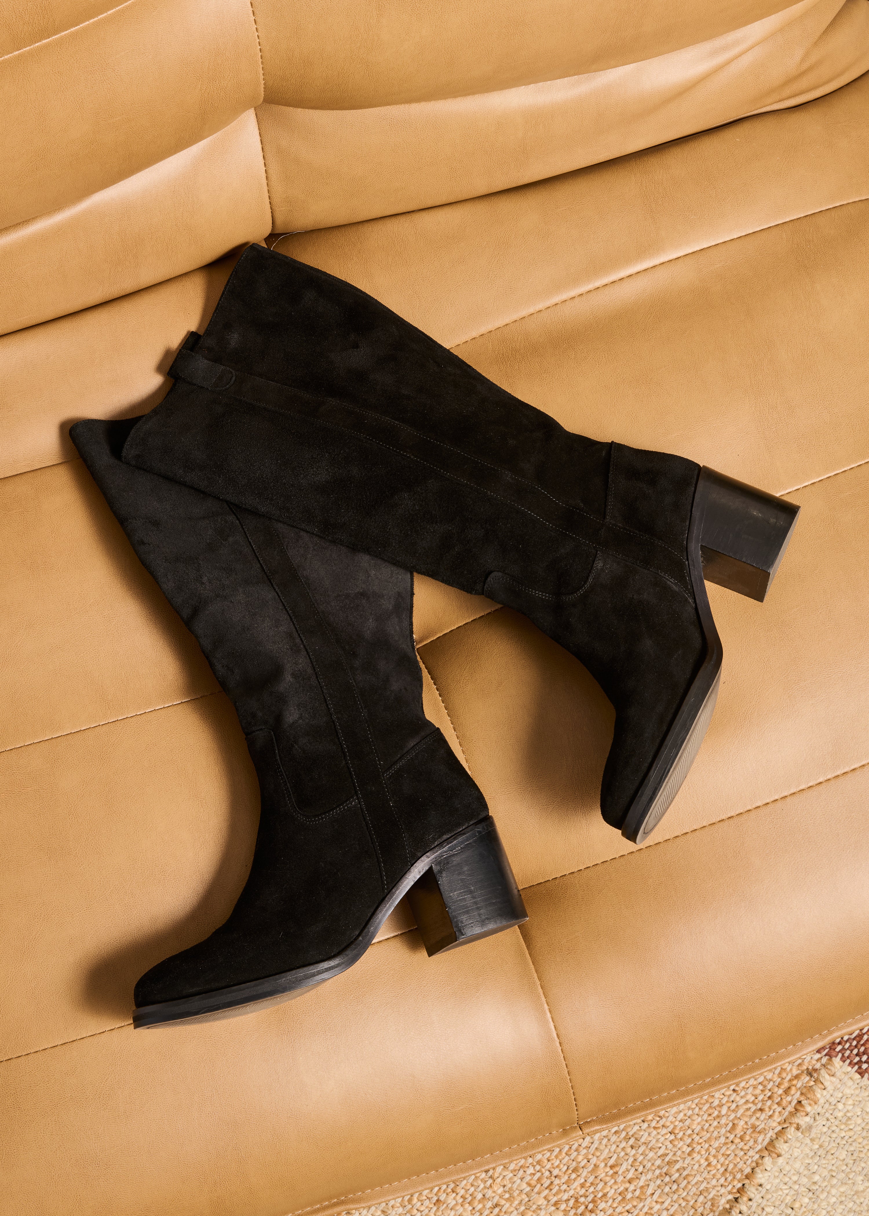 Black boots with leather heels