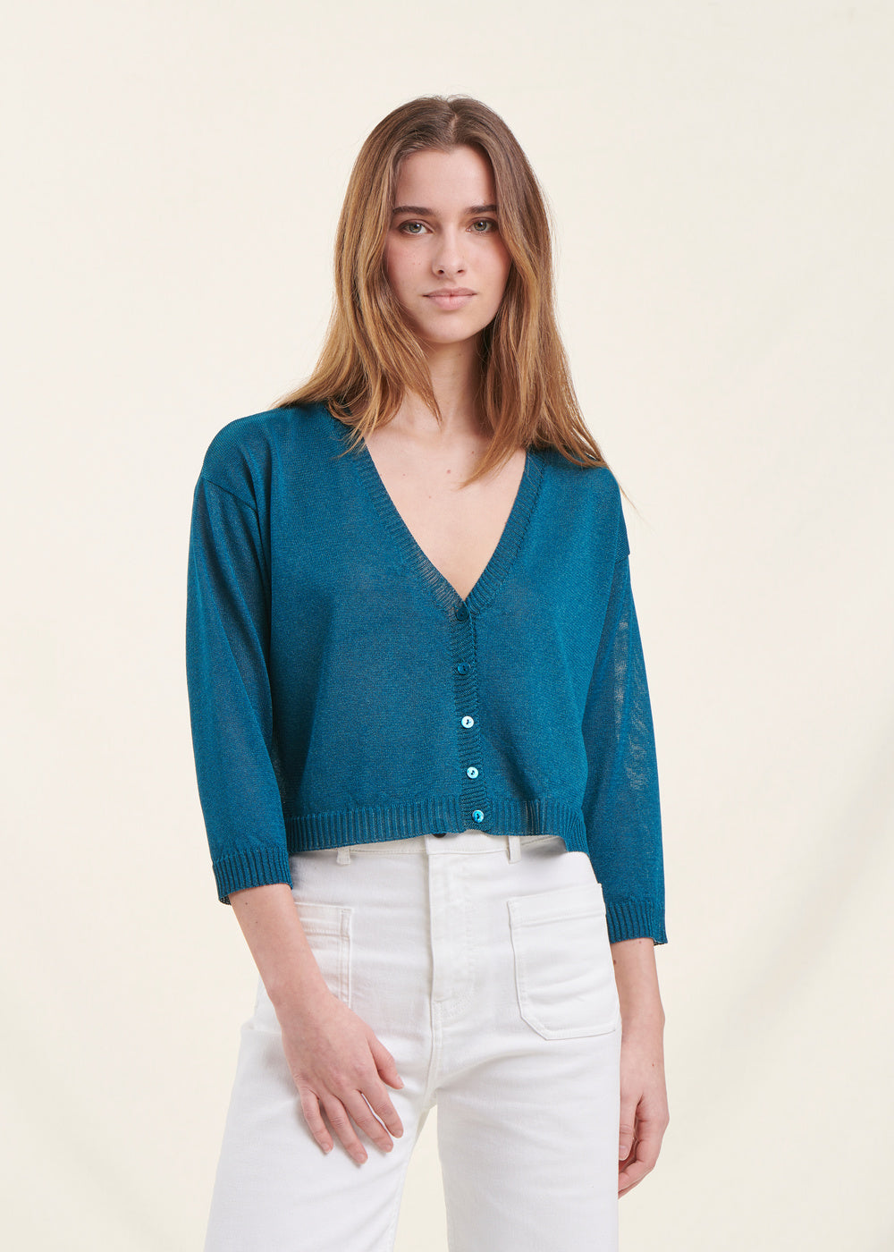 Short petrol blue cardigan with long sleeves and V-neck