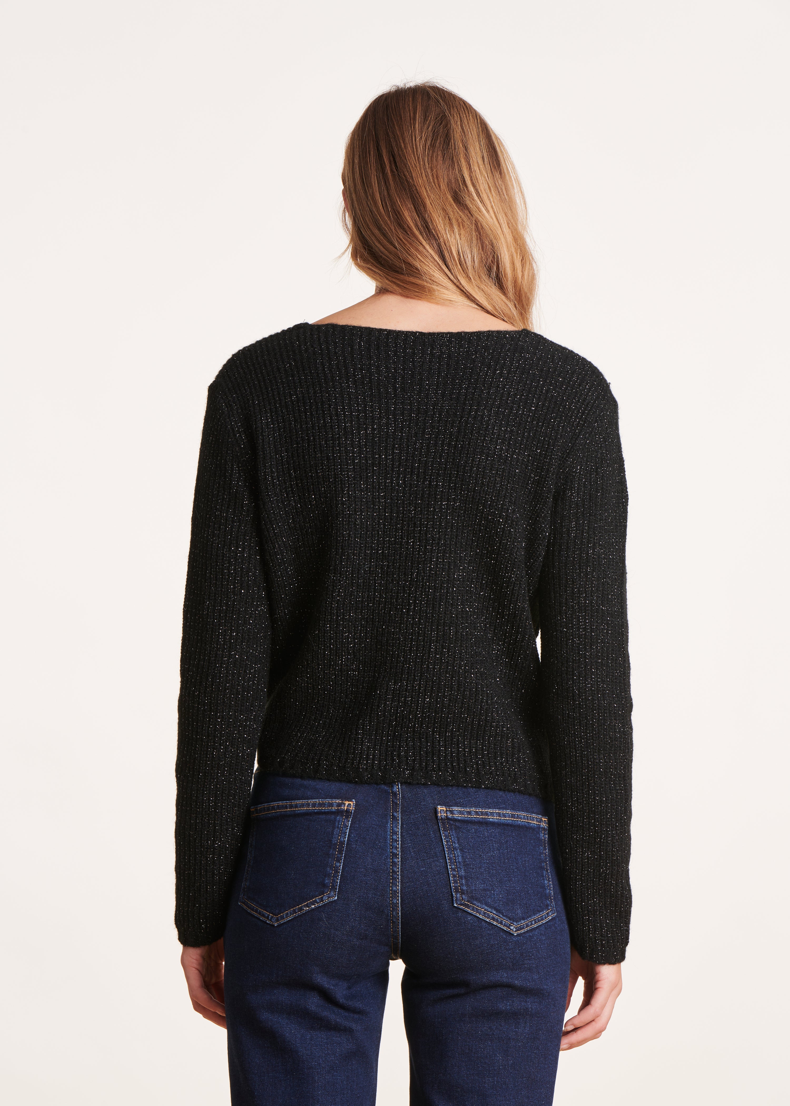 Short black iridescent knit sweater with bow