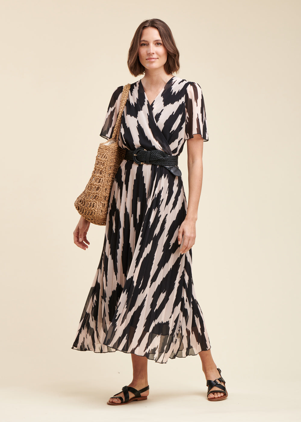 Long pleated dress in printed polyester voile