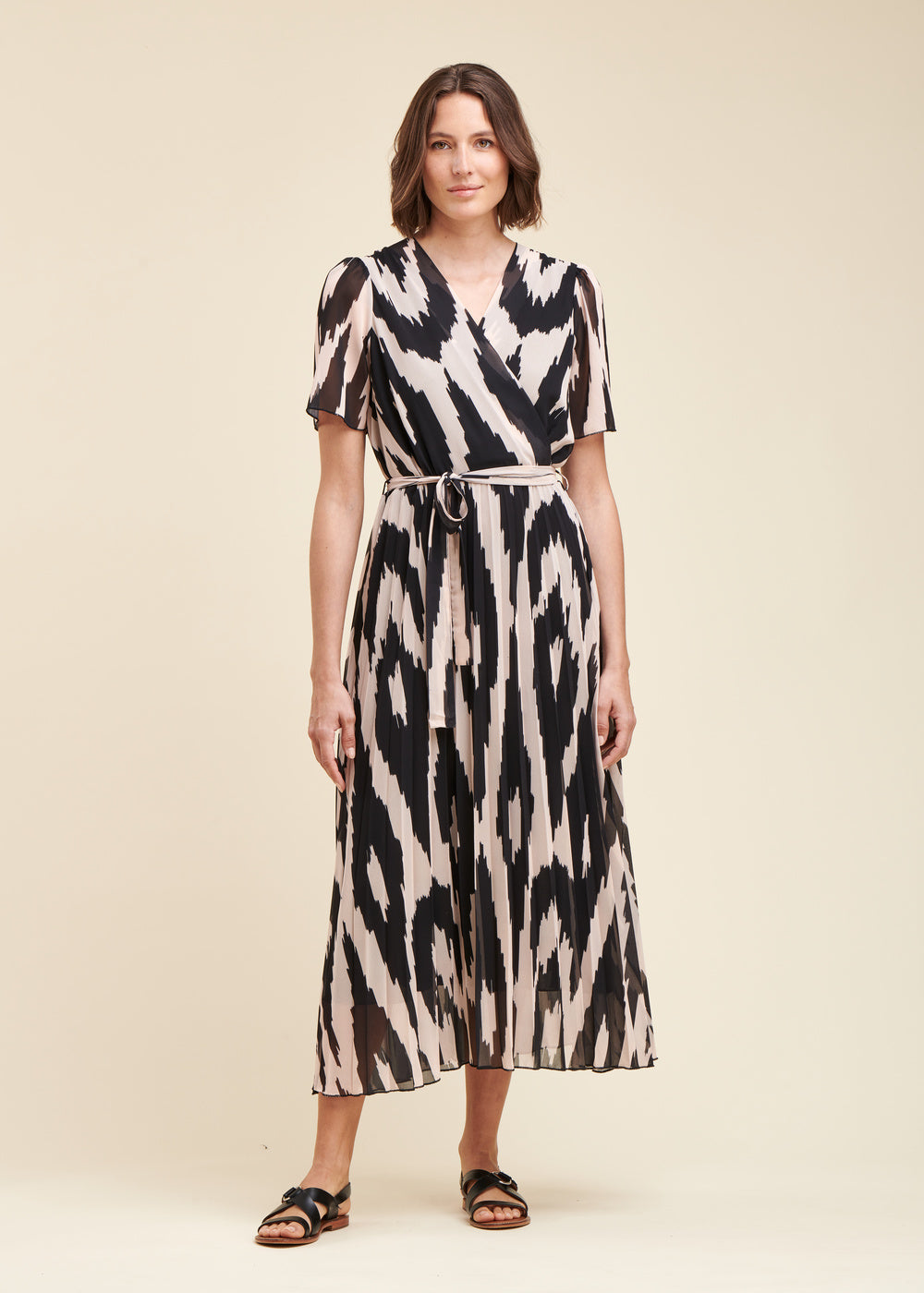 Long pleated dress in printed polyester voile