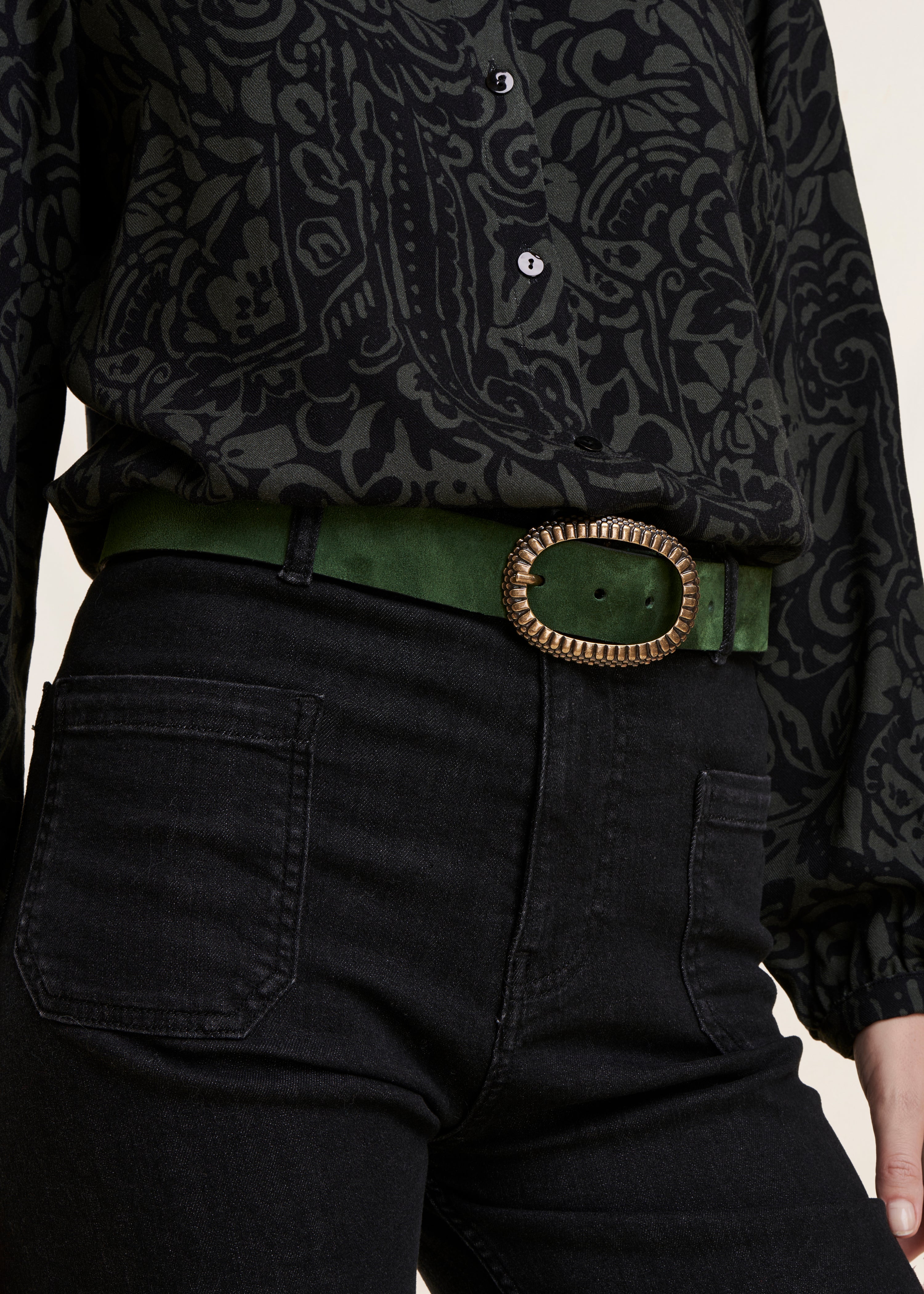 Green belt with fancy oval buckle