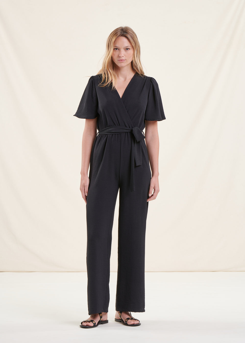 Black jumpsuit with wrap neckline