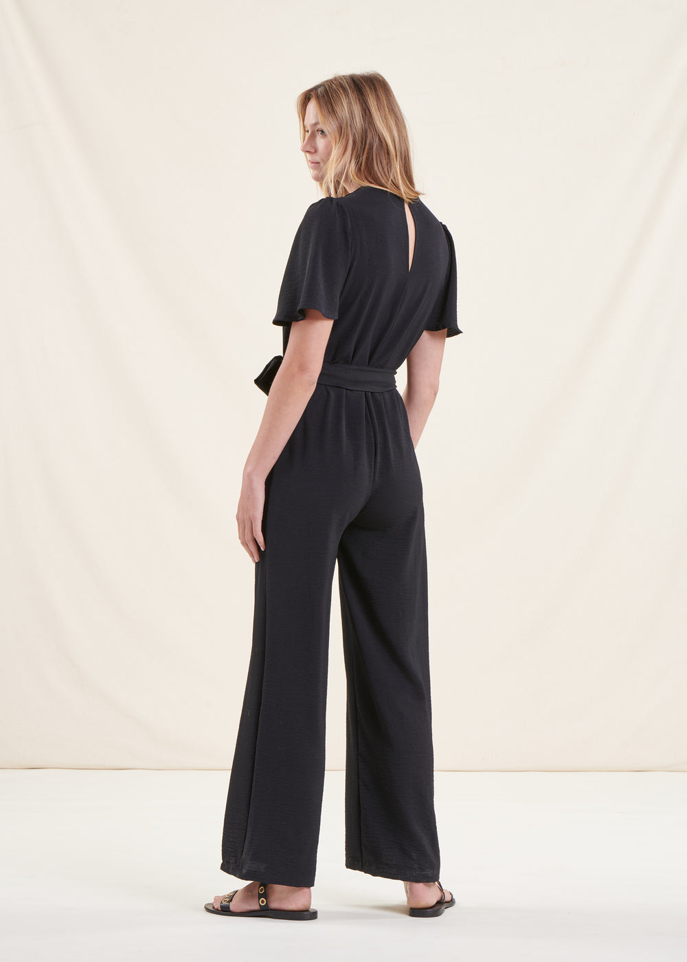 Black jumpsuit with wrap neckline