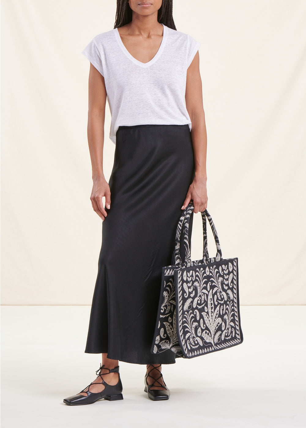 Jupe longue fluide noire en satin