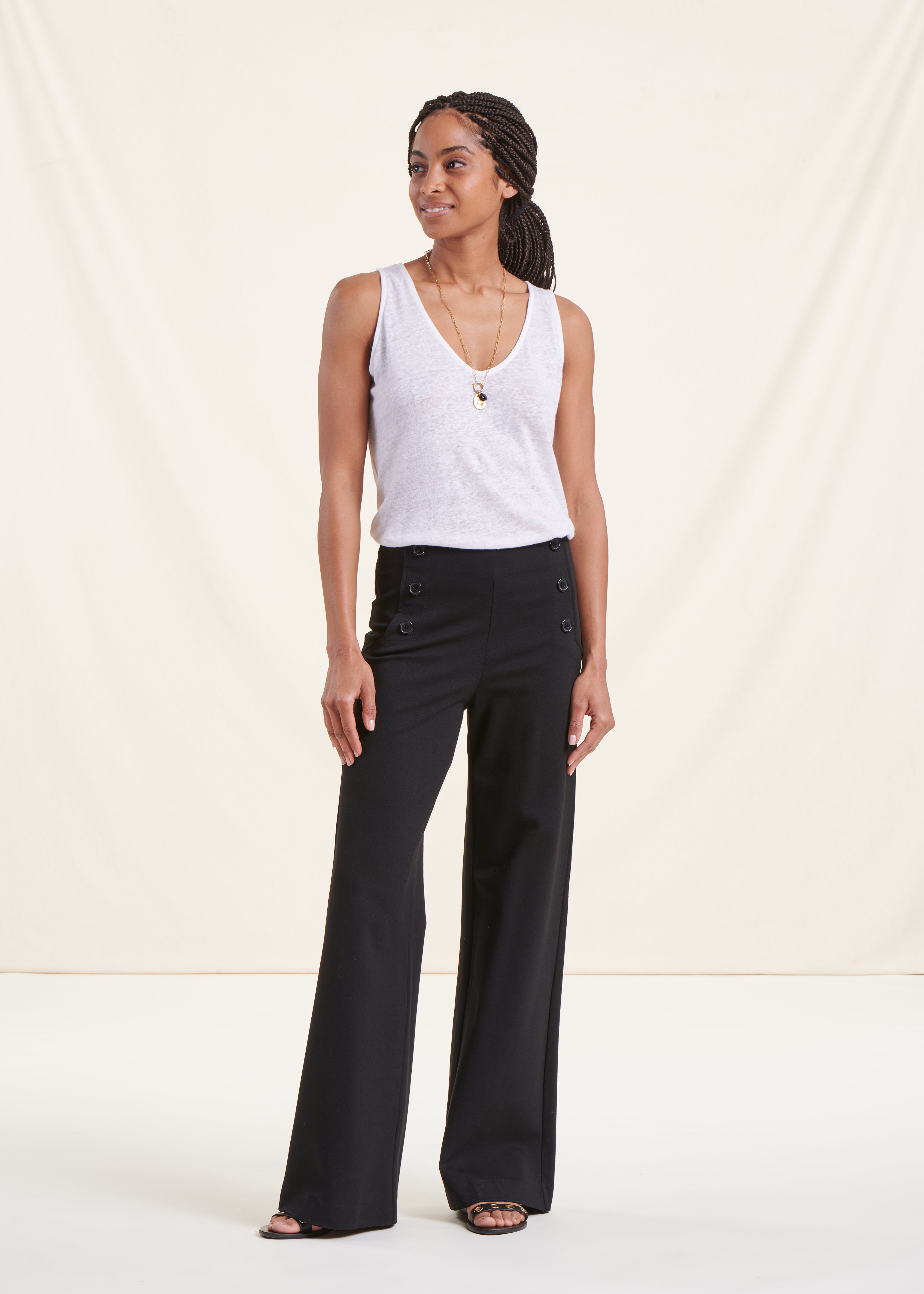 black high-waisted jersey trousers