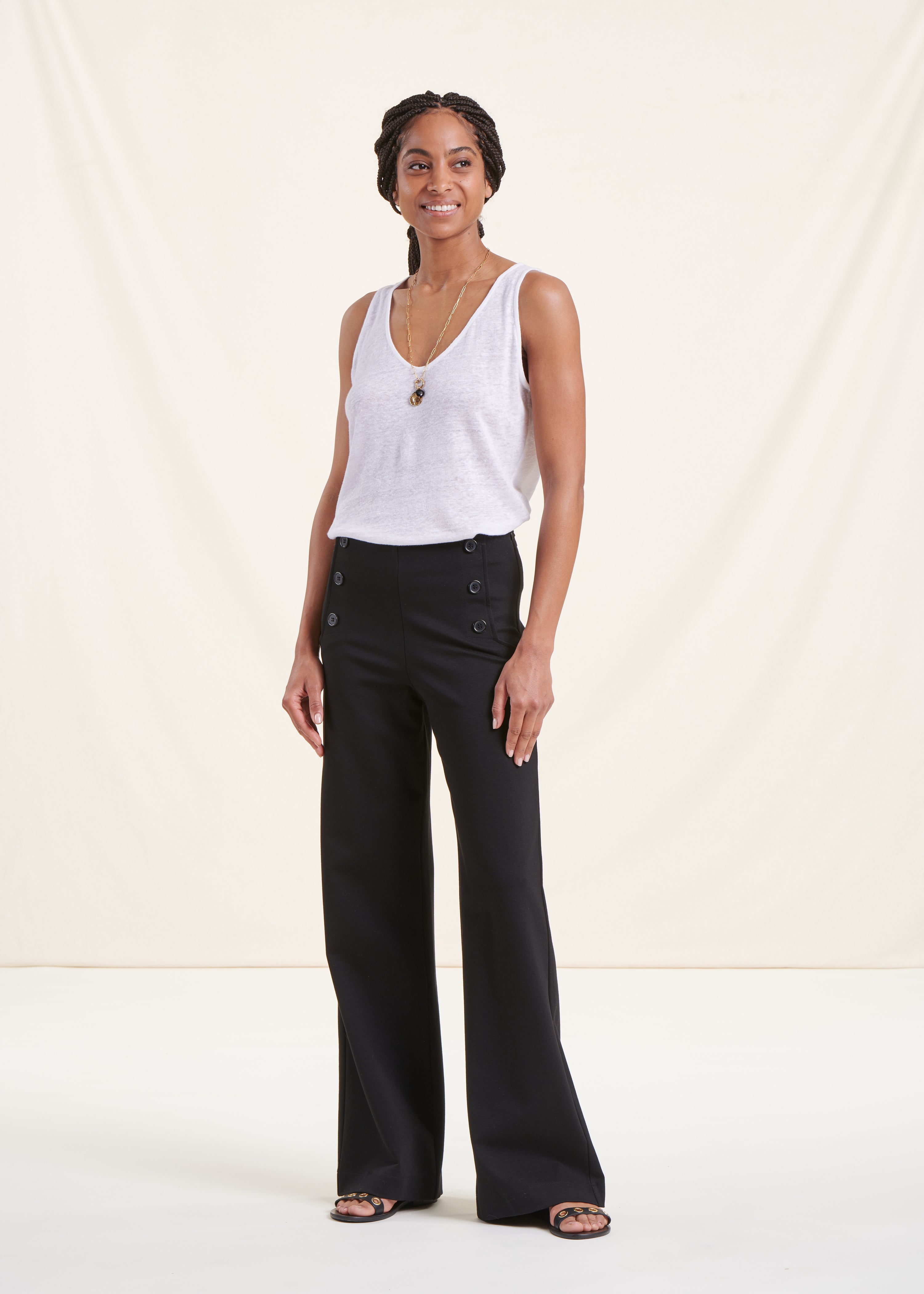 black high-waisted jersey trousers