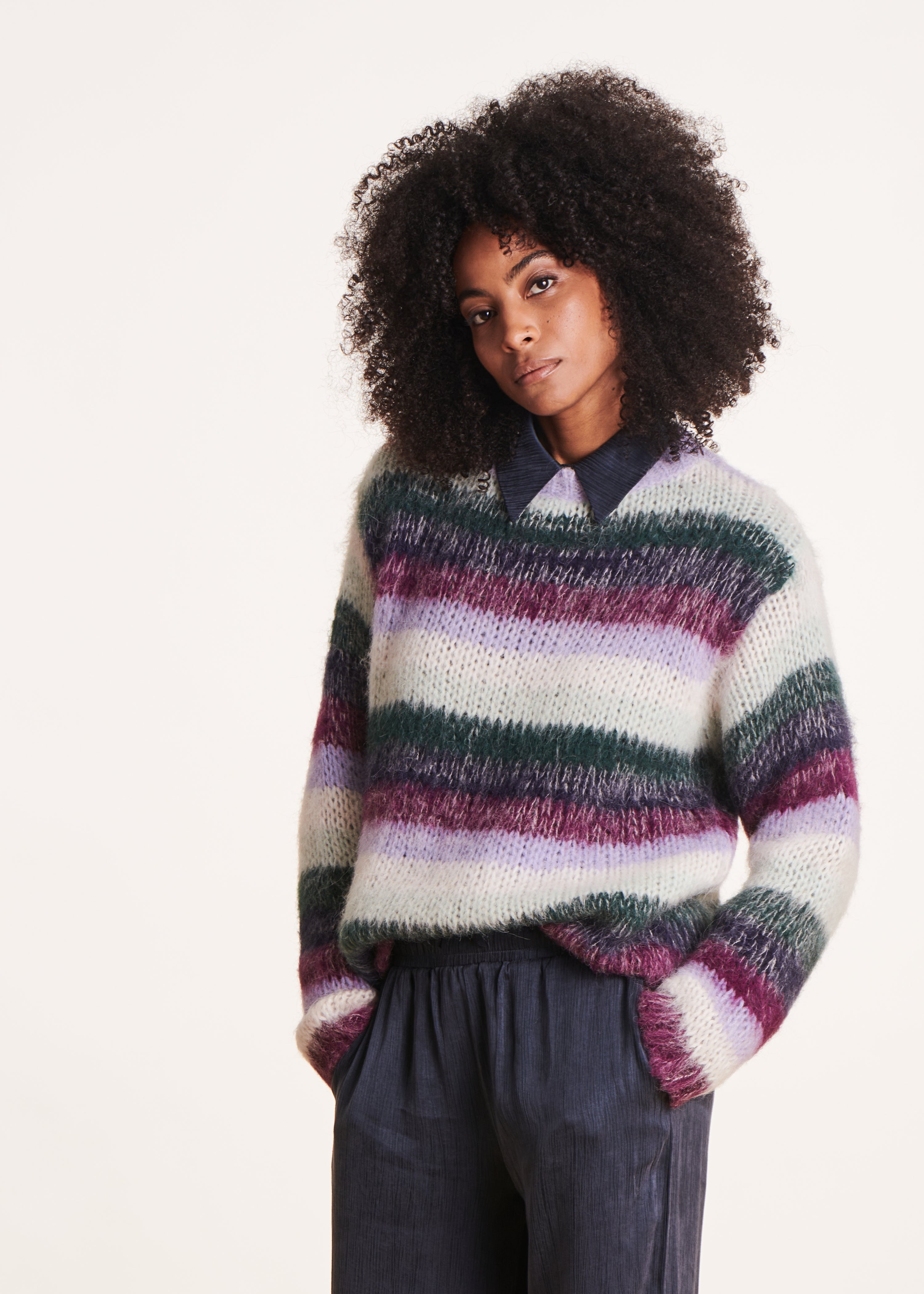 Loose purple and white sweater with wide stripes