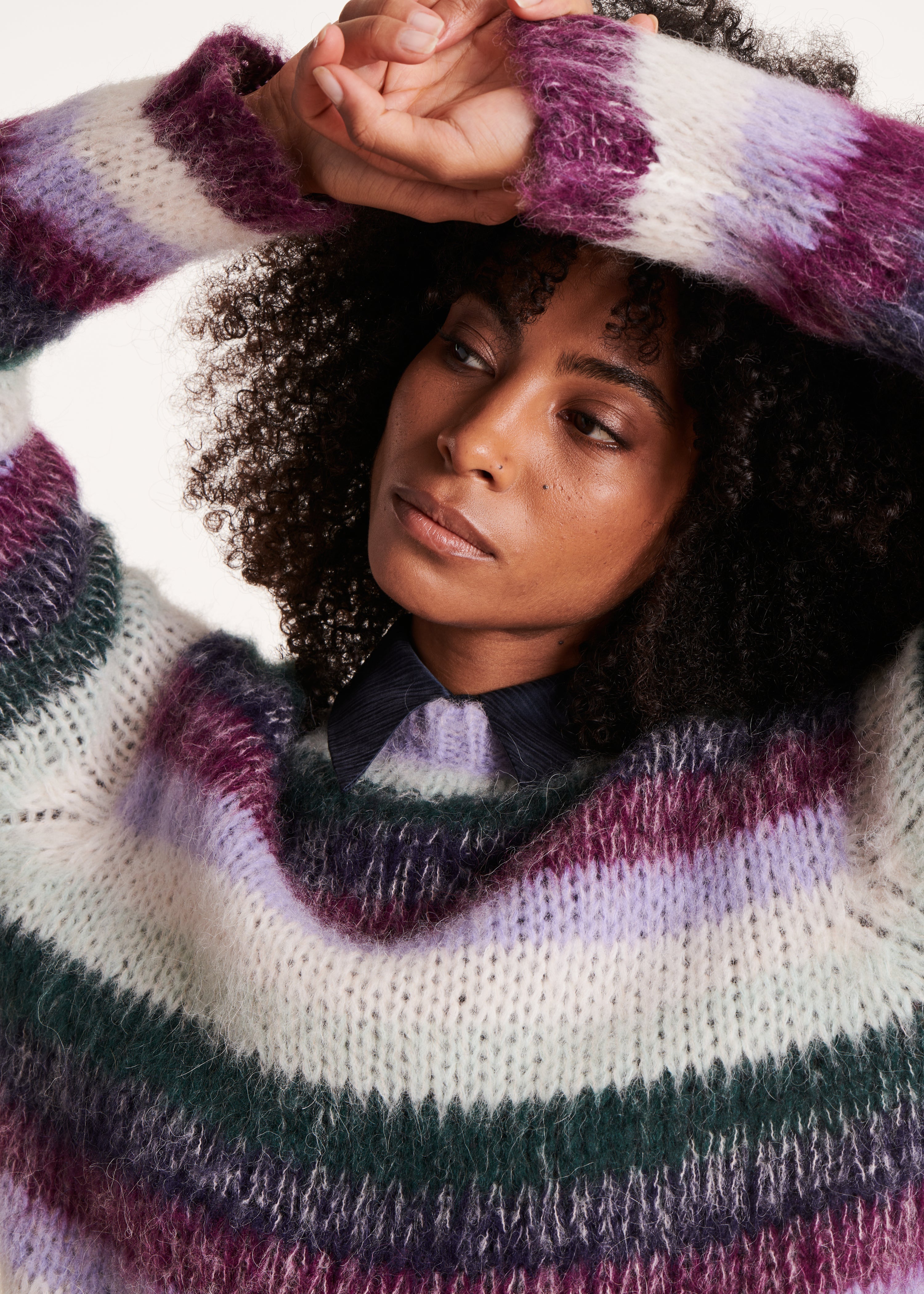 Loose purple and white sweater with wide stripes