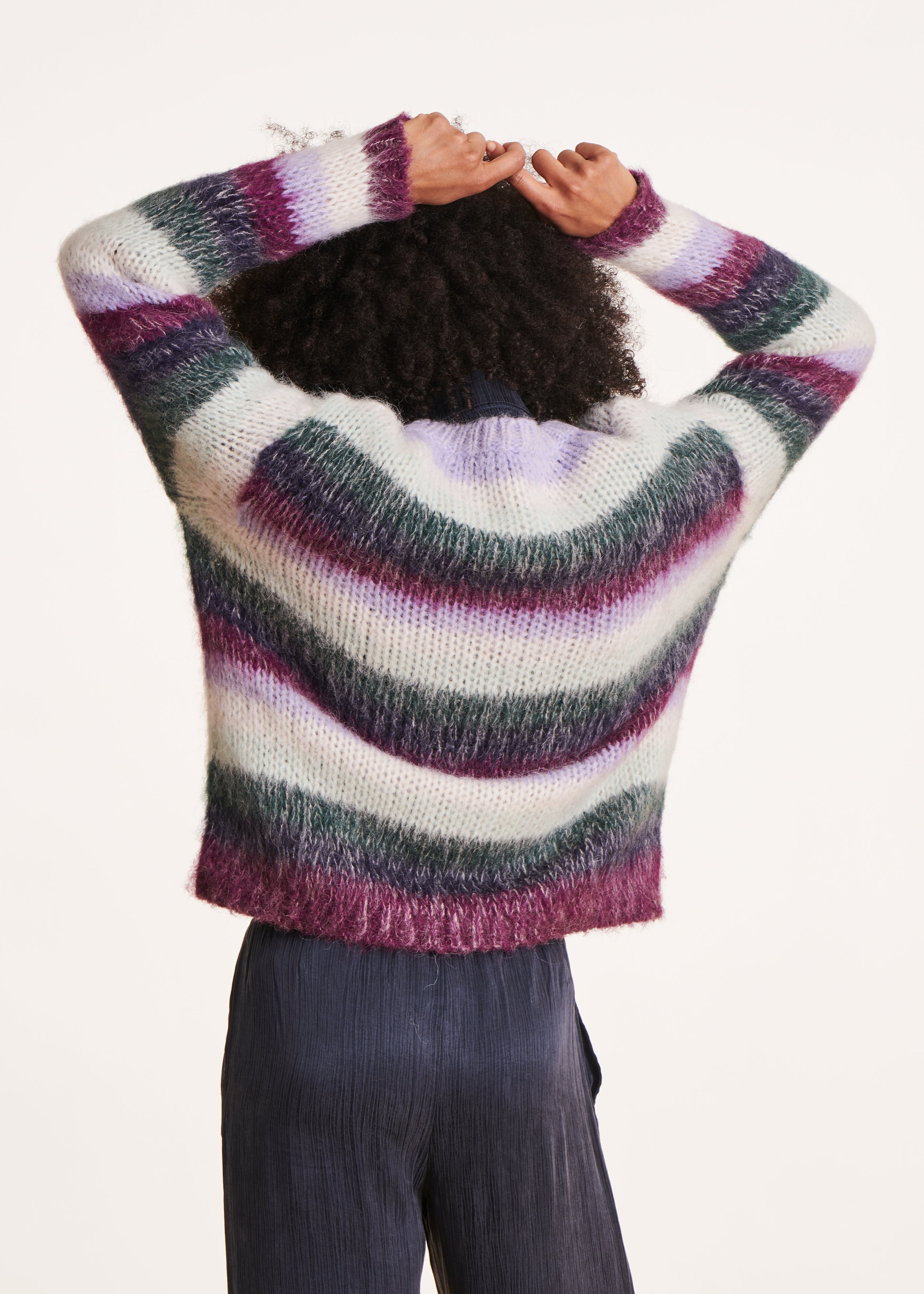 Loose purple and white sweater with wide stripes