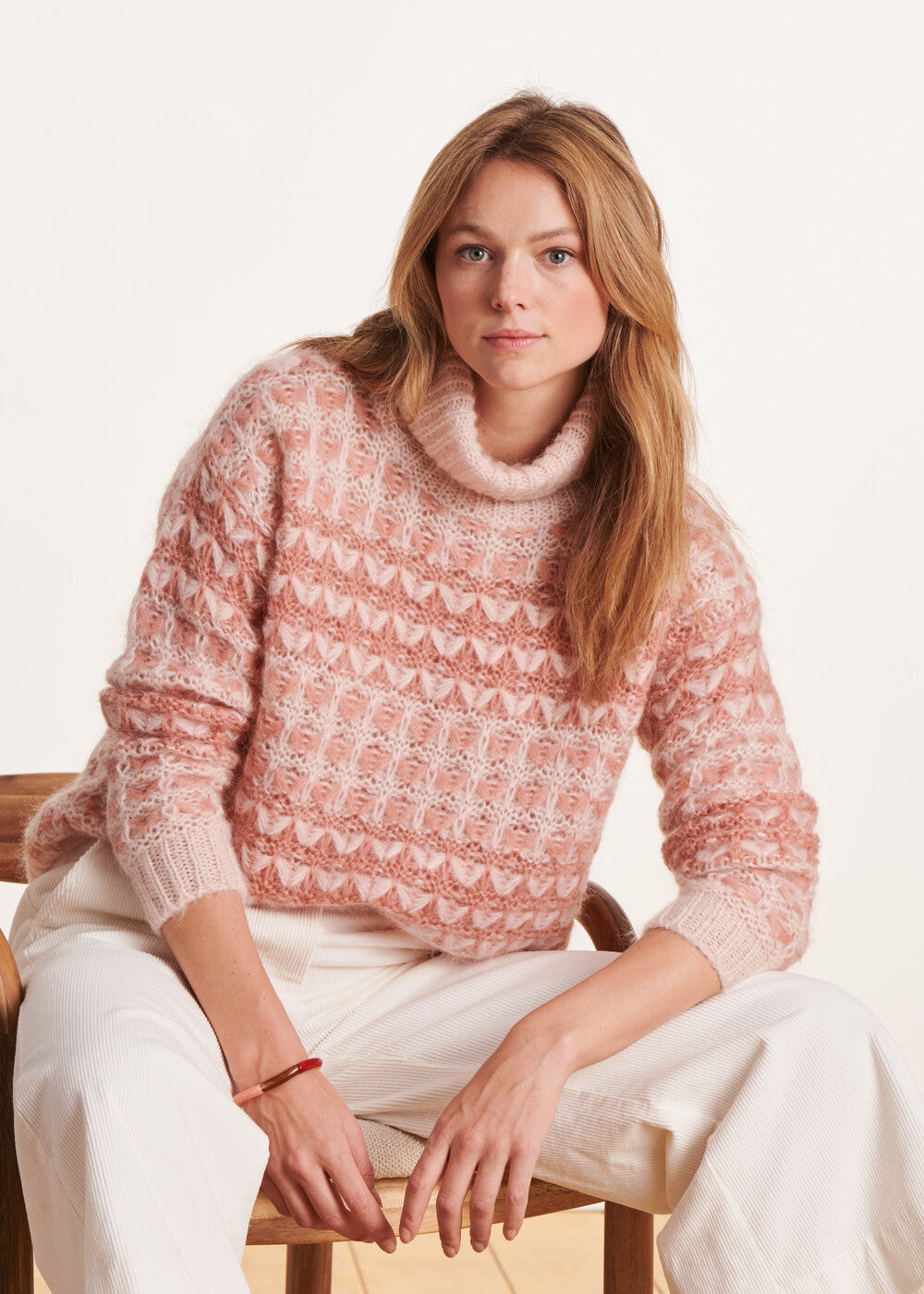 Pink jacquard turtleneck sweater