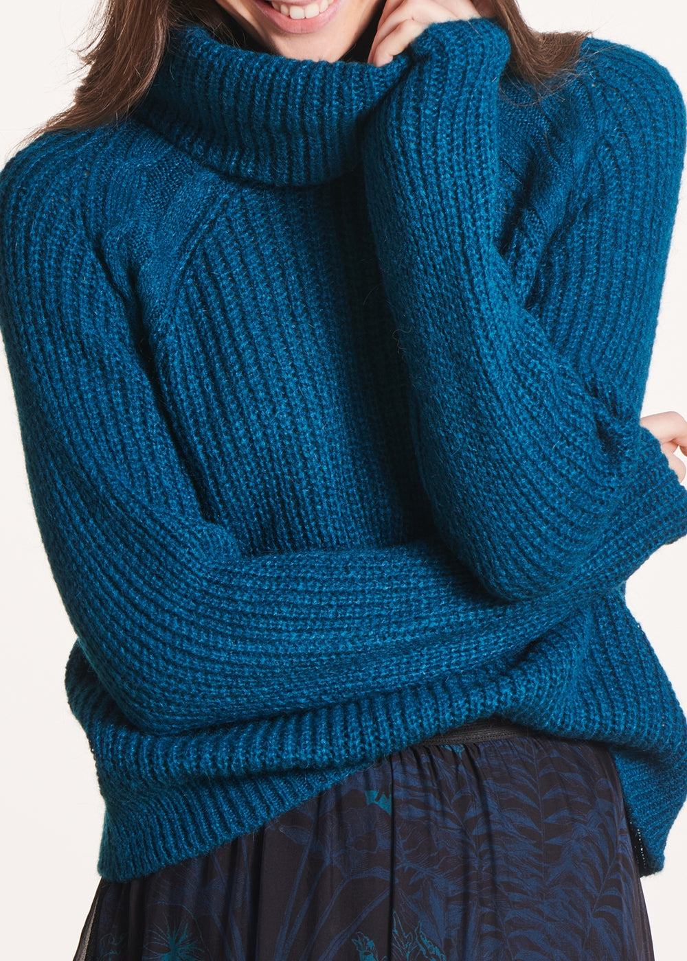 Maglione di lana blu petrolio