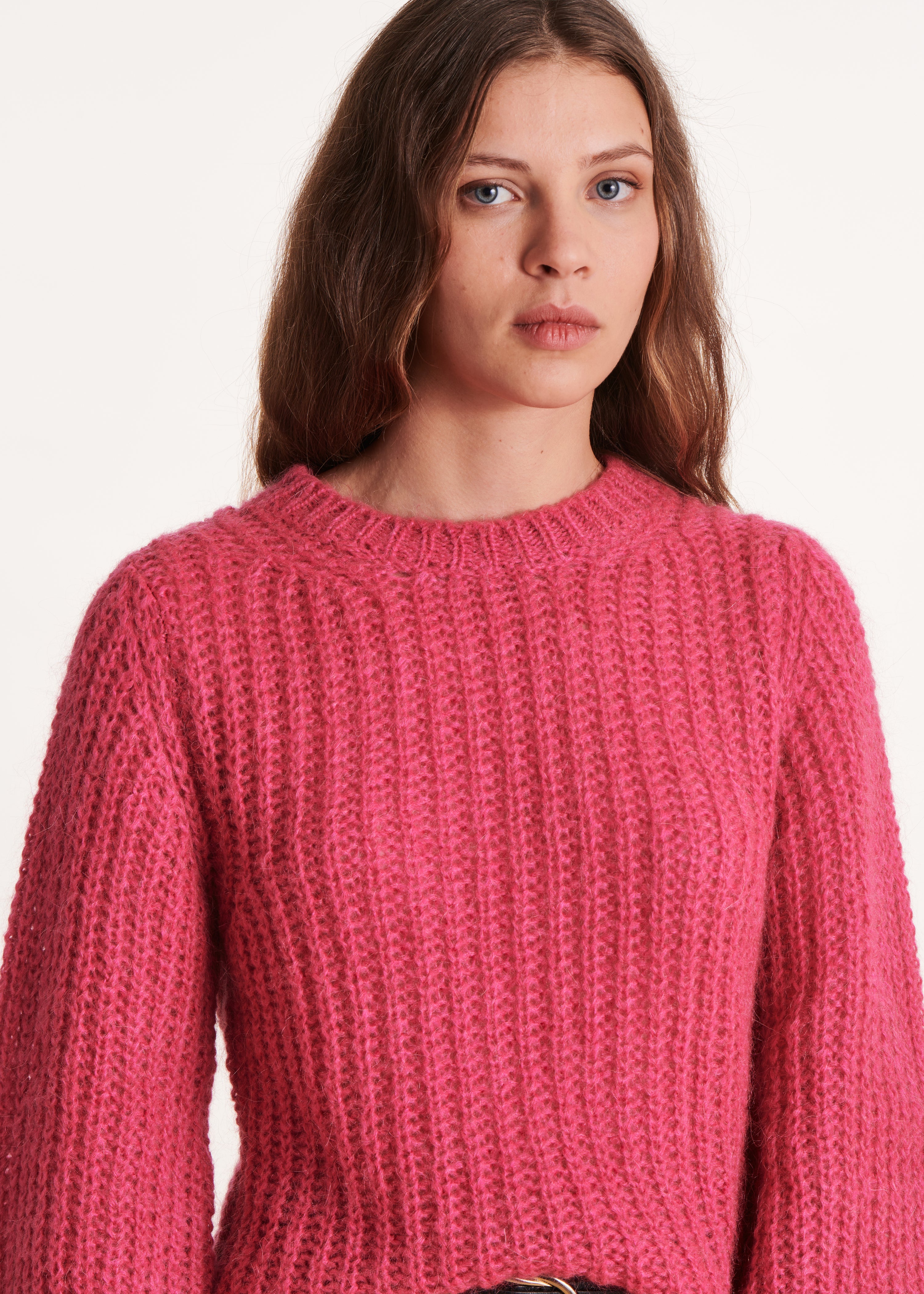 Fuchsia pink sweater with round neckline