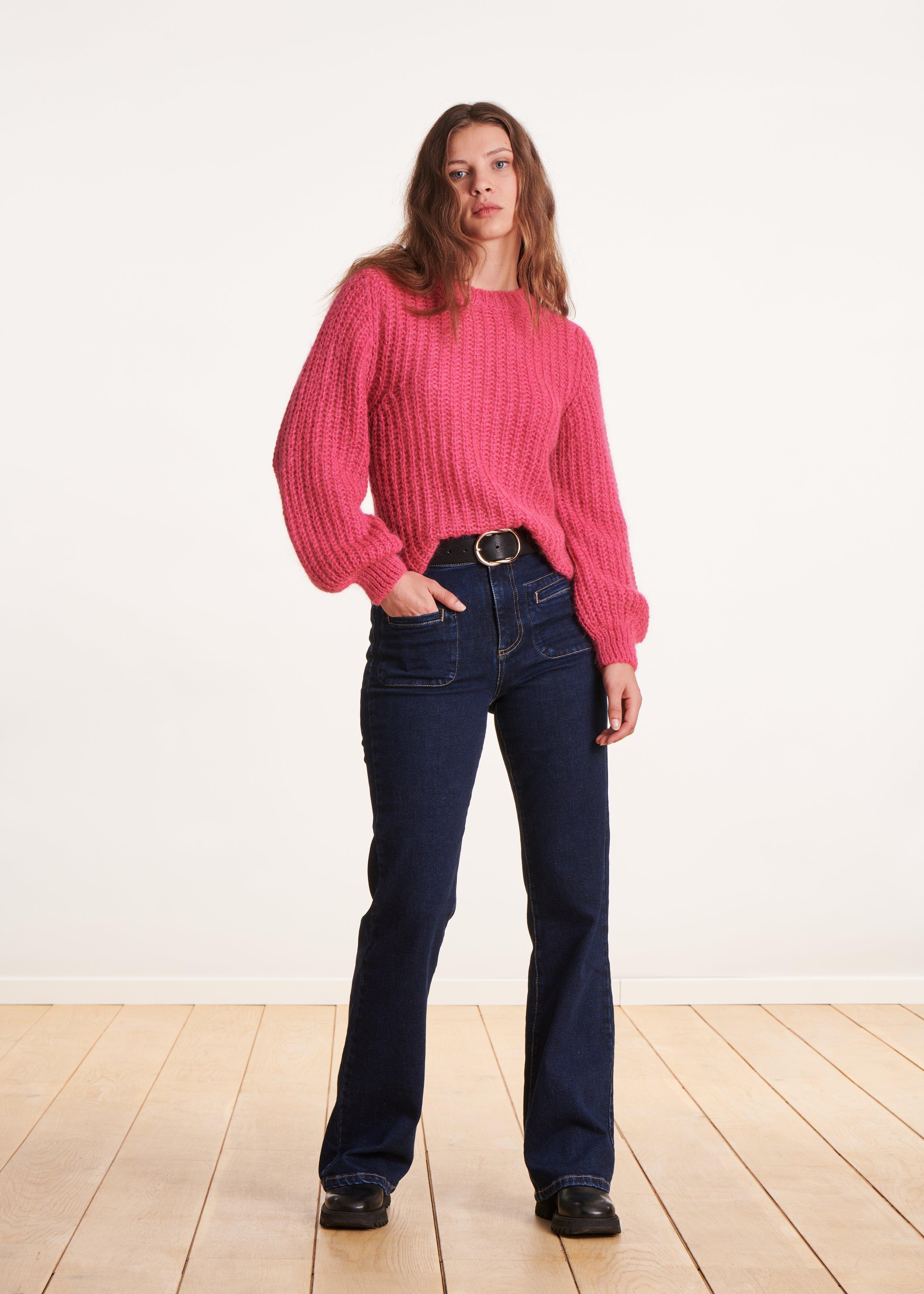 Fuchsia pink sweater with round neckline