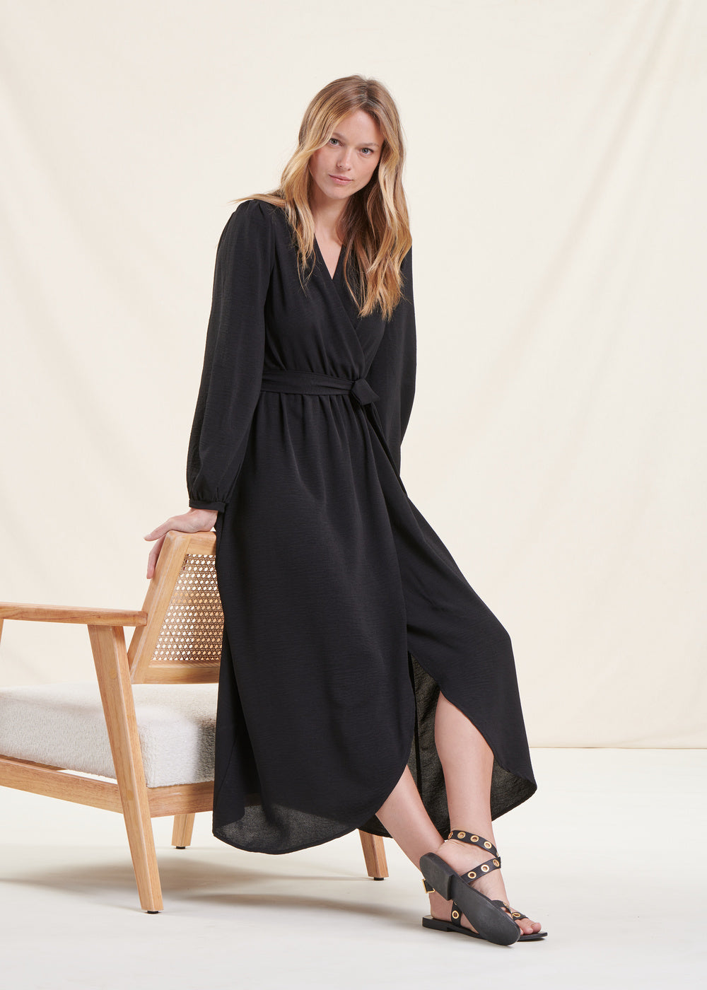 Long black faux wrap dress with long sleeves