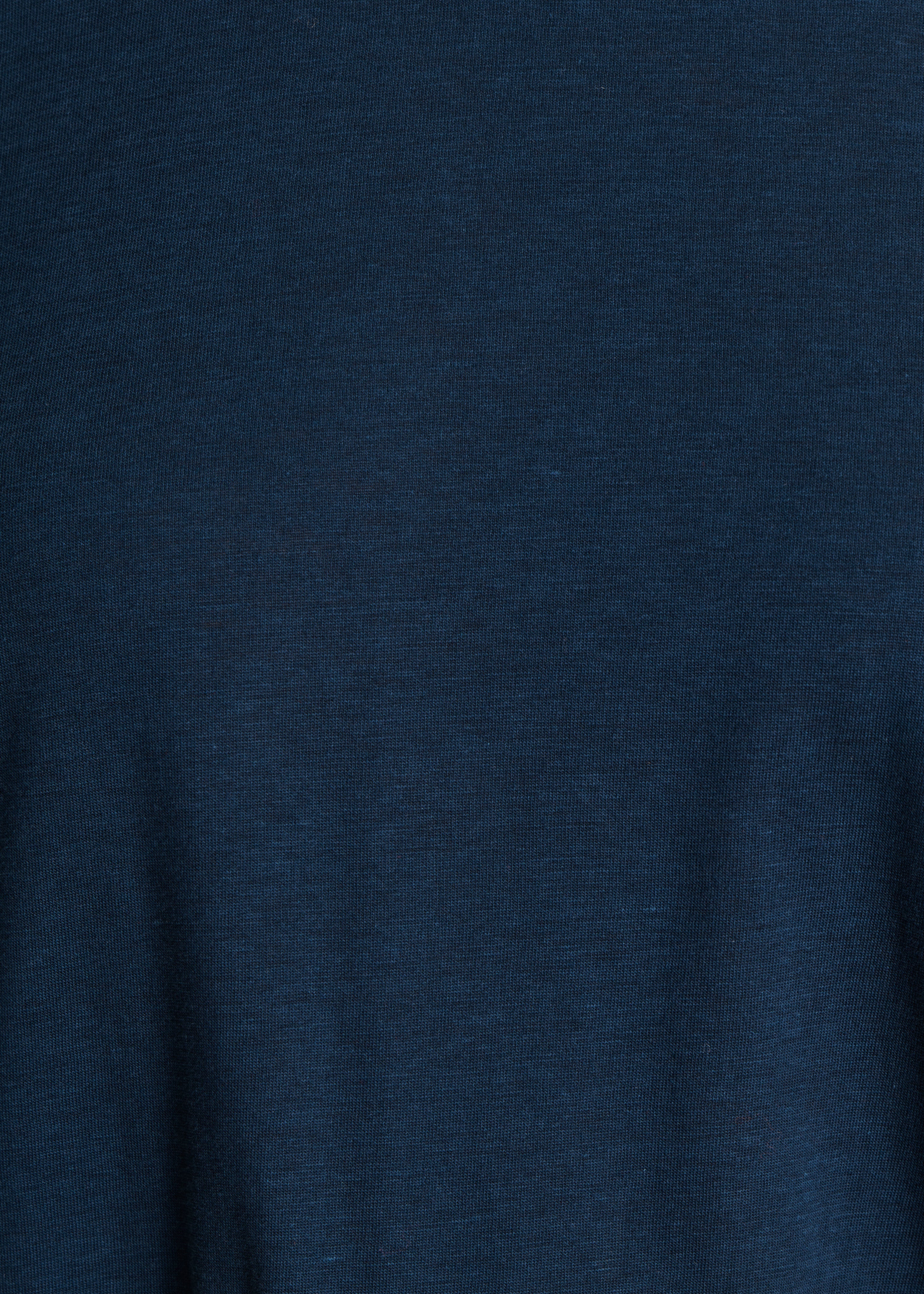 Flowing petrol blue T-shirt to tie