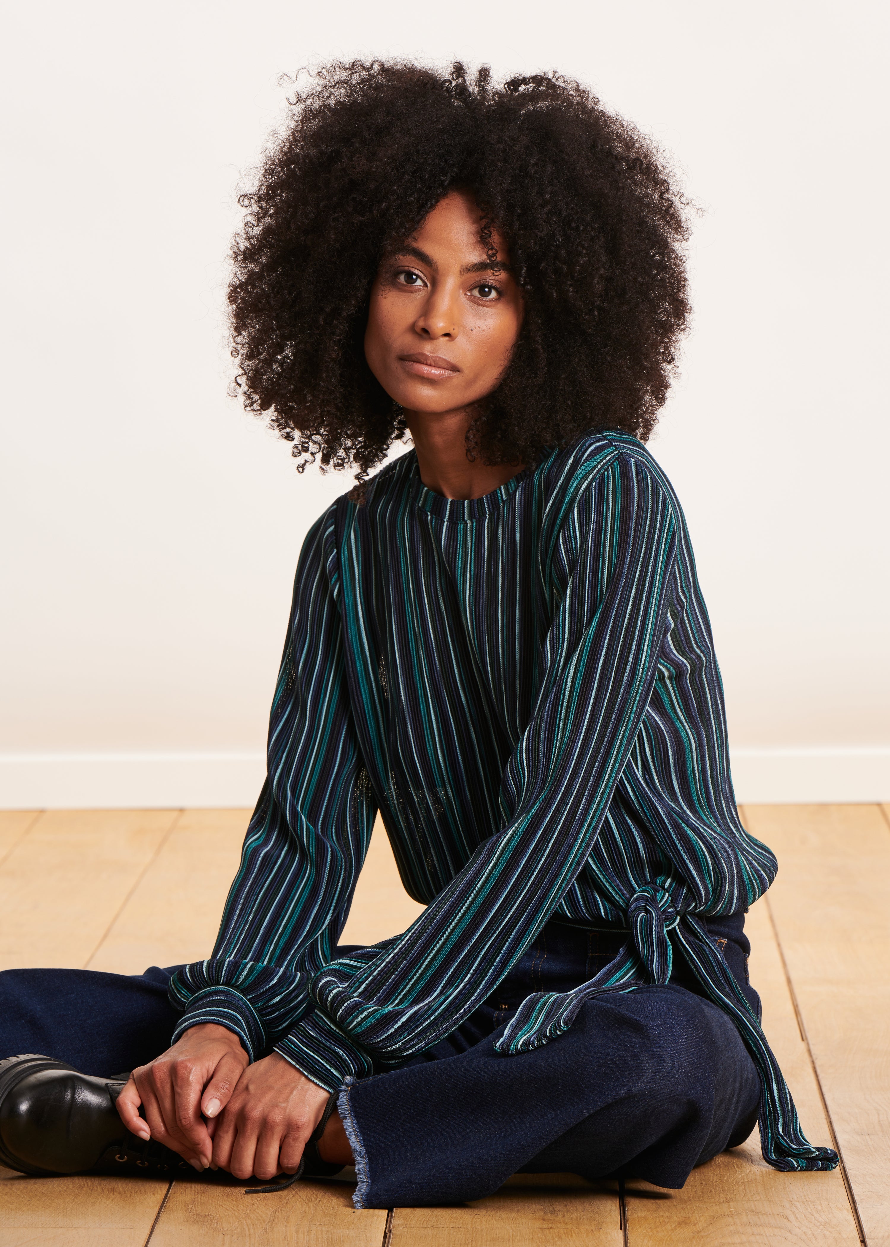 Blue T-shirt with multicoloured stripes