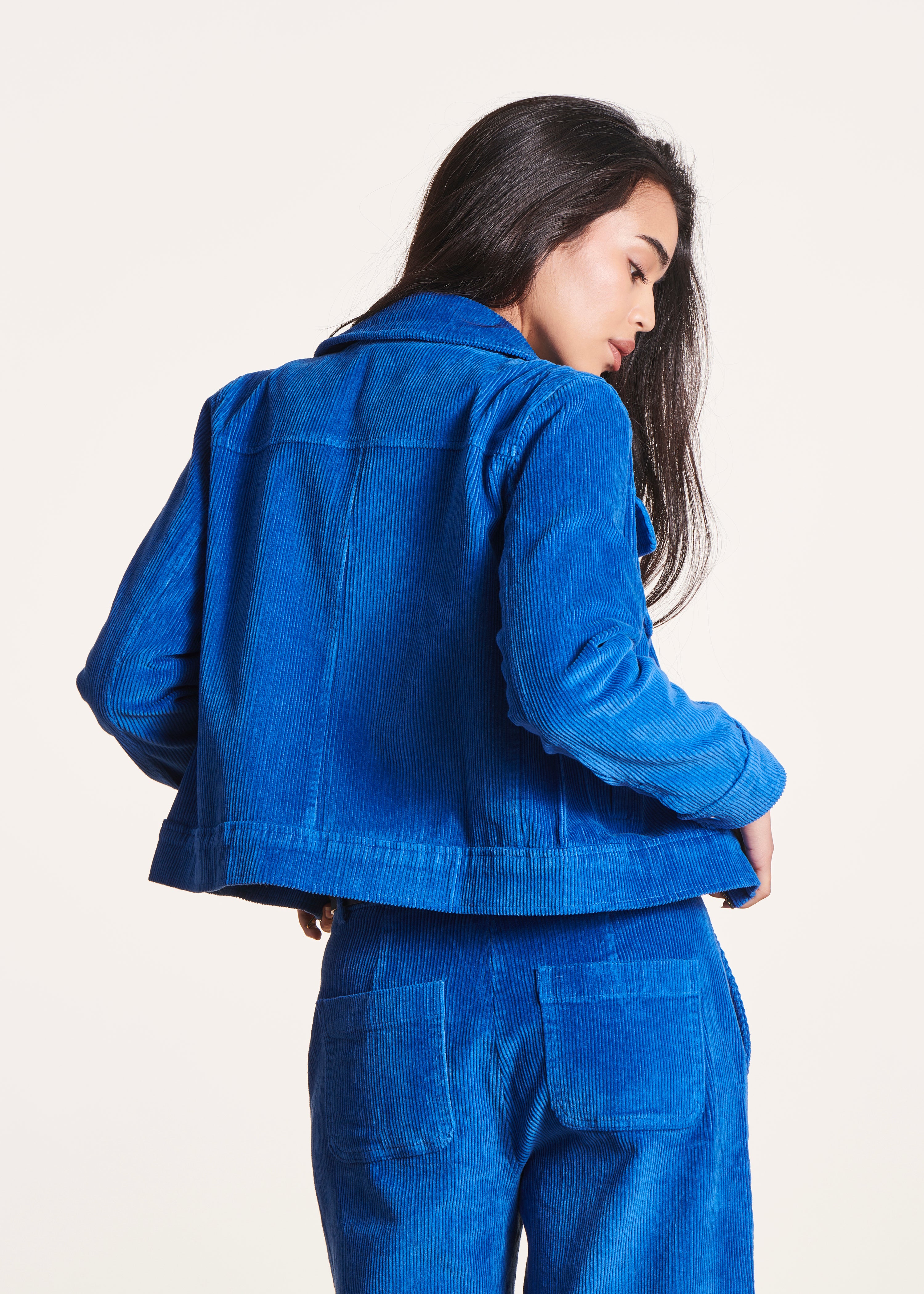 Short royal blue zipped velvet jacket