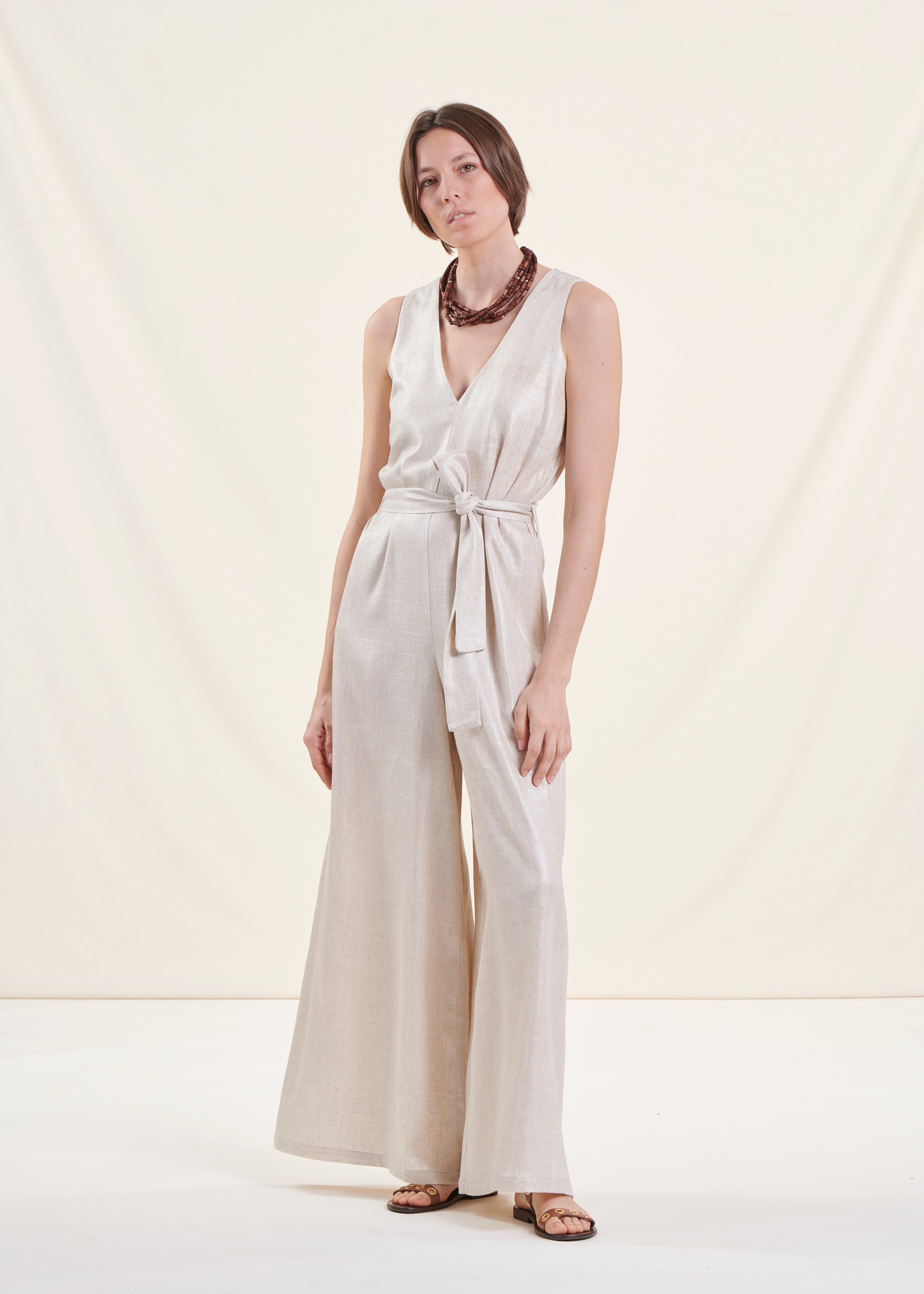 Beige mouwloze iriserende linnen jumpsuit