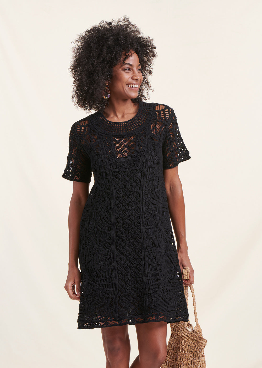 Short black crochet dress with short sleeves