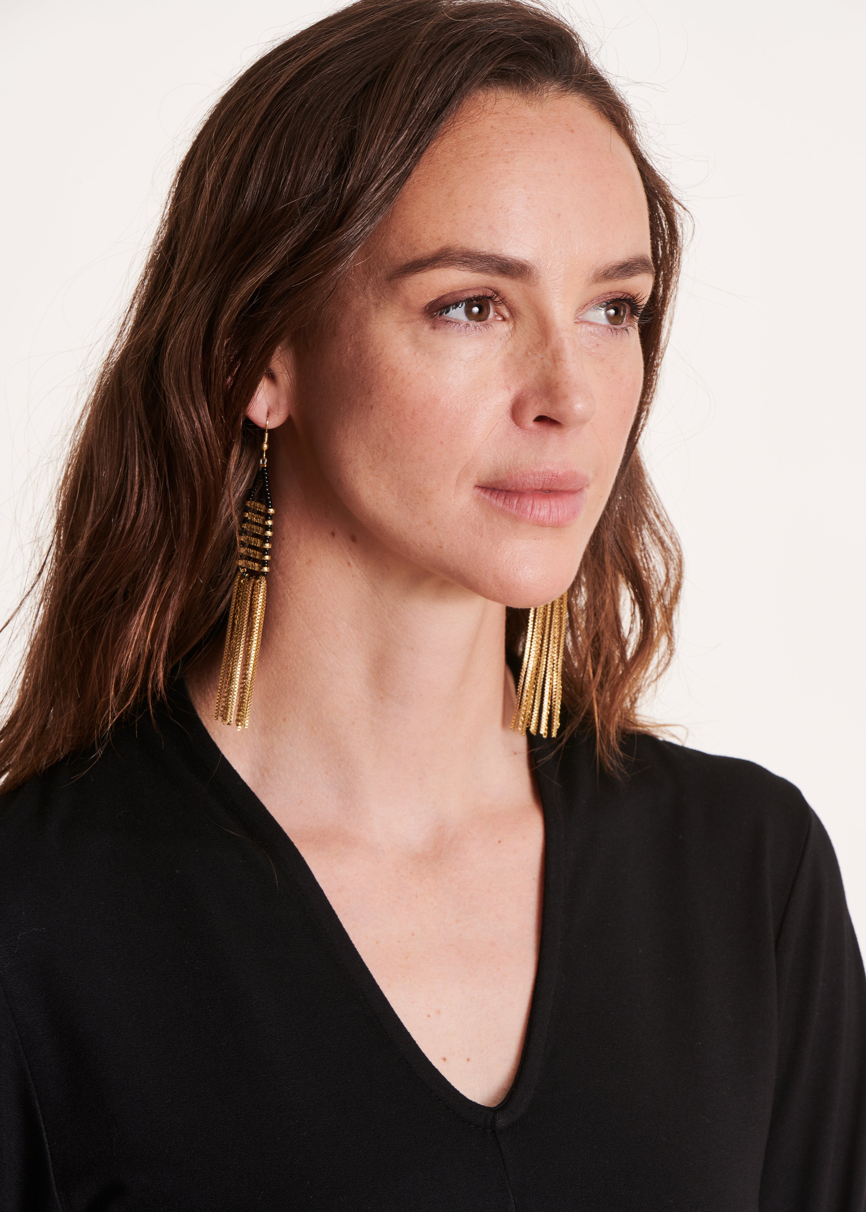 Gold chain and black pearl tassel earrings