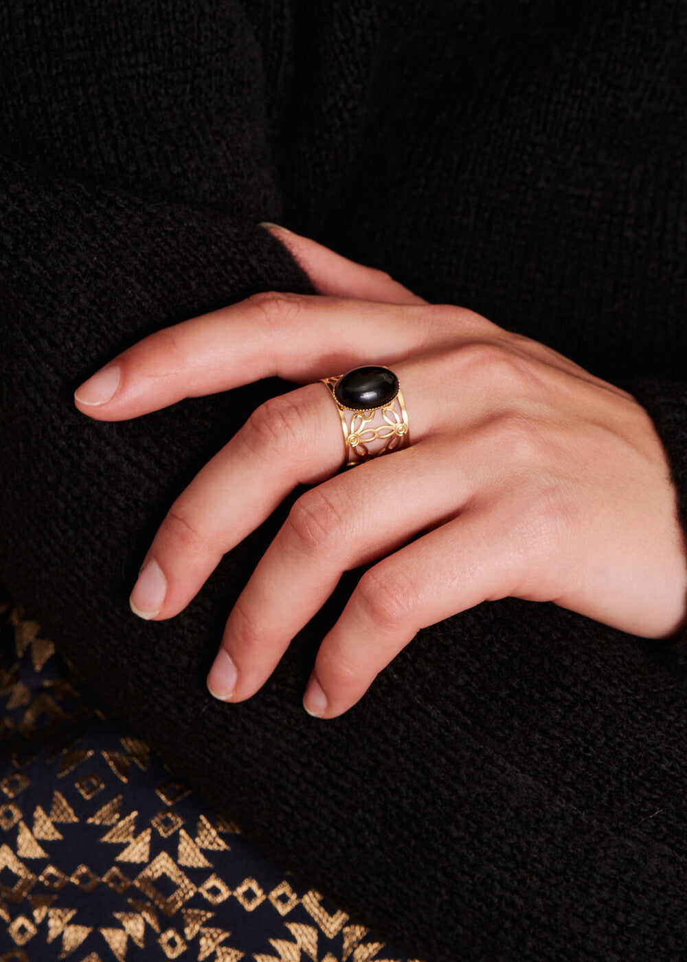 Gold ring with black stone