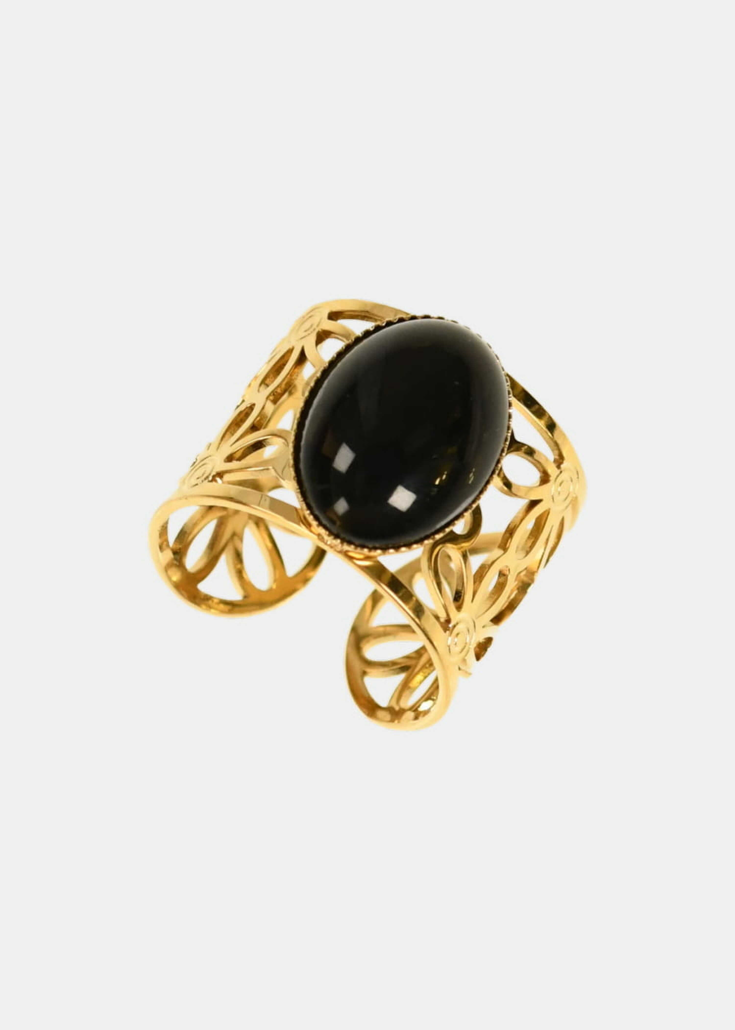 Gold ring with black stone