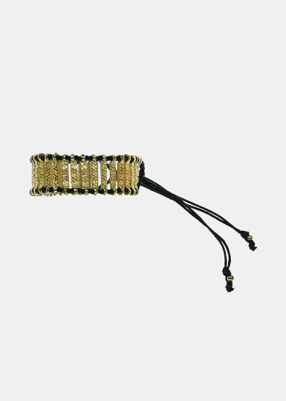 Pulsera ancha de oro con eslabones negros