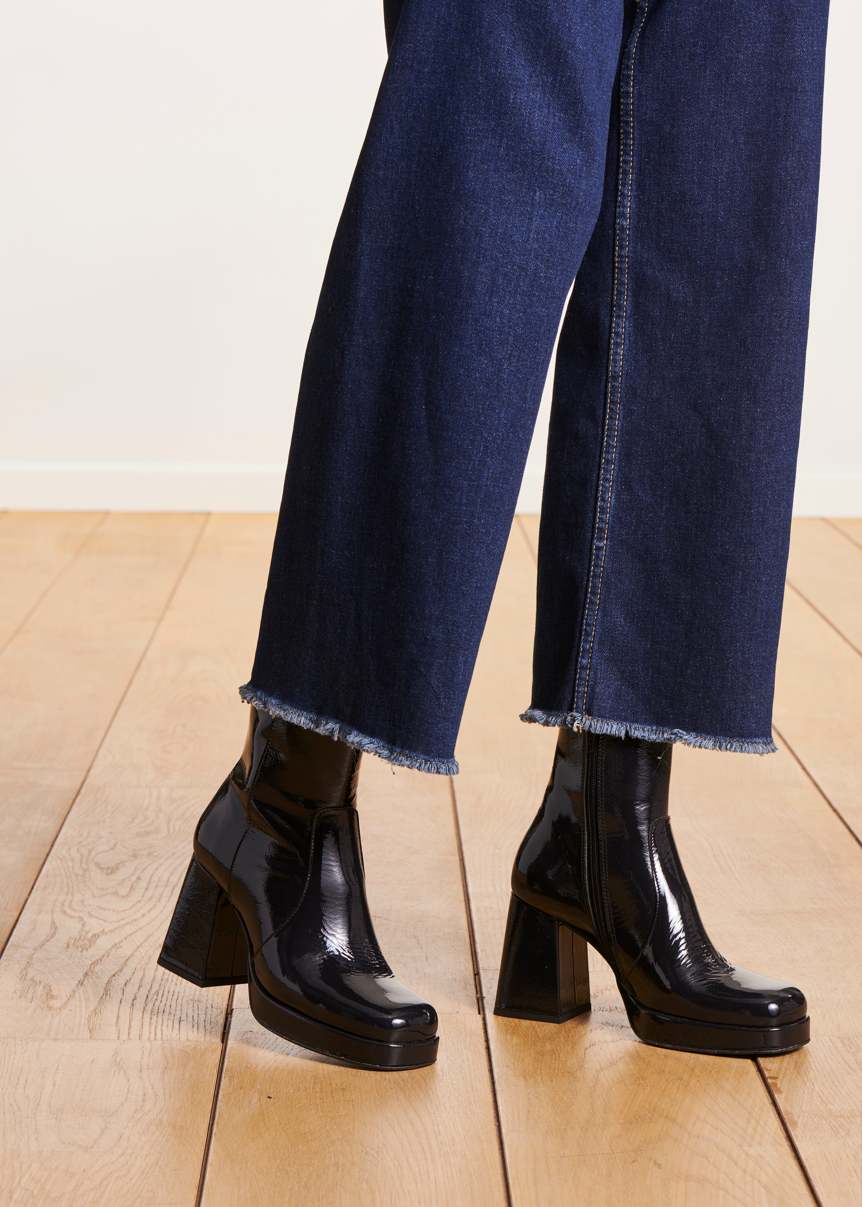 Navy blue patent ankle boots with heels