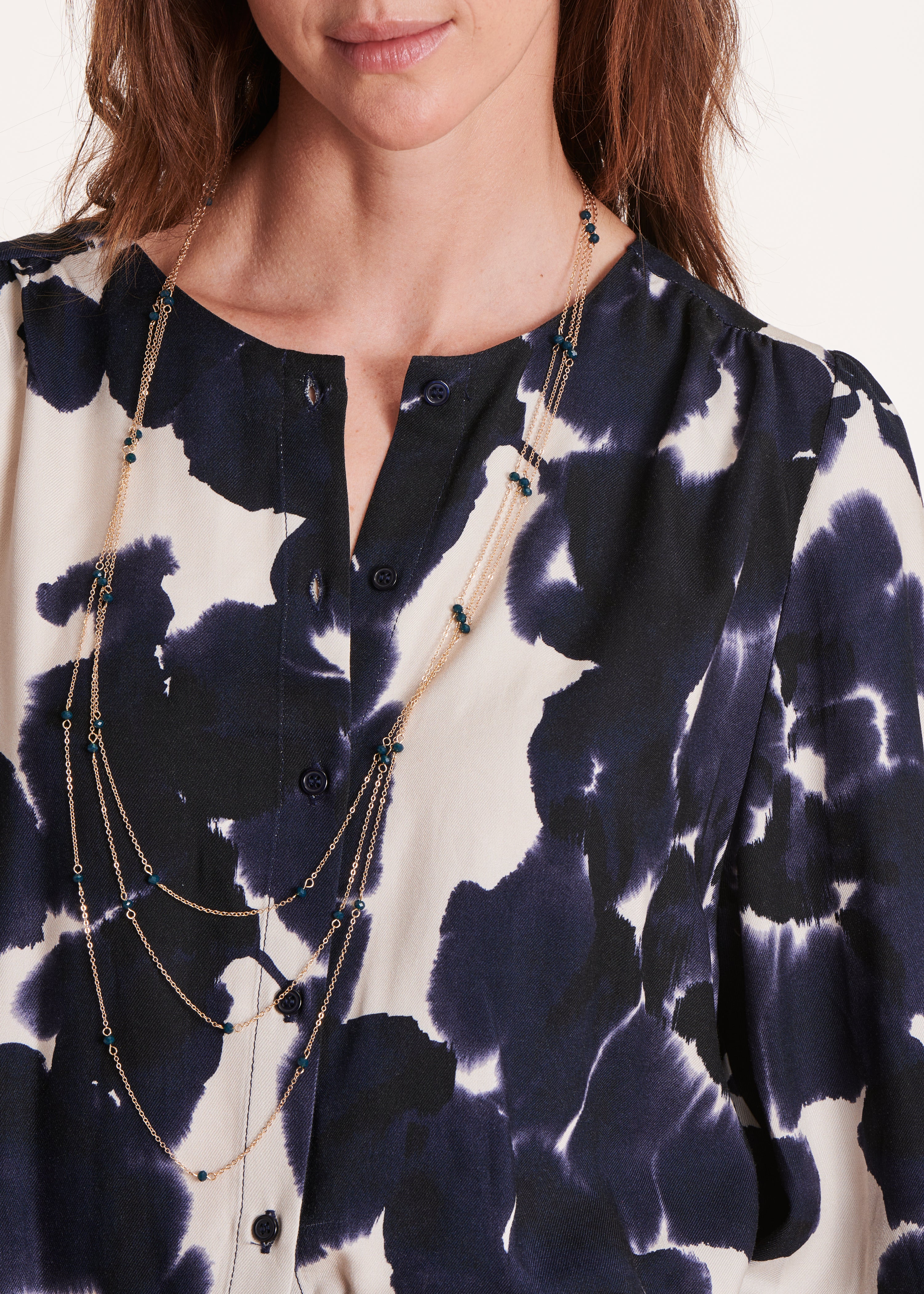 Blue floral printed V-neck blouse