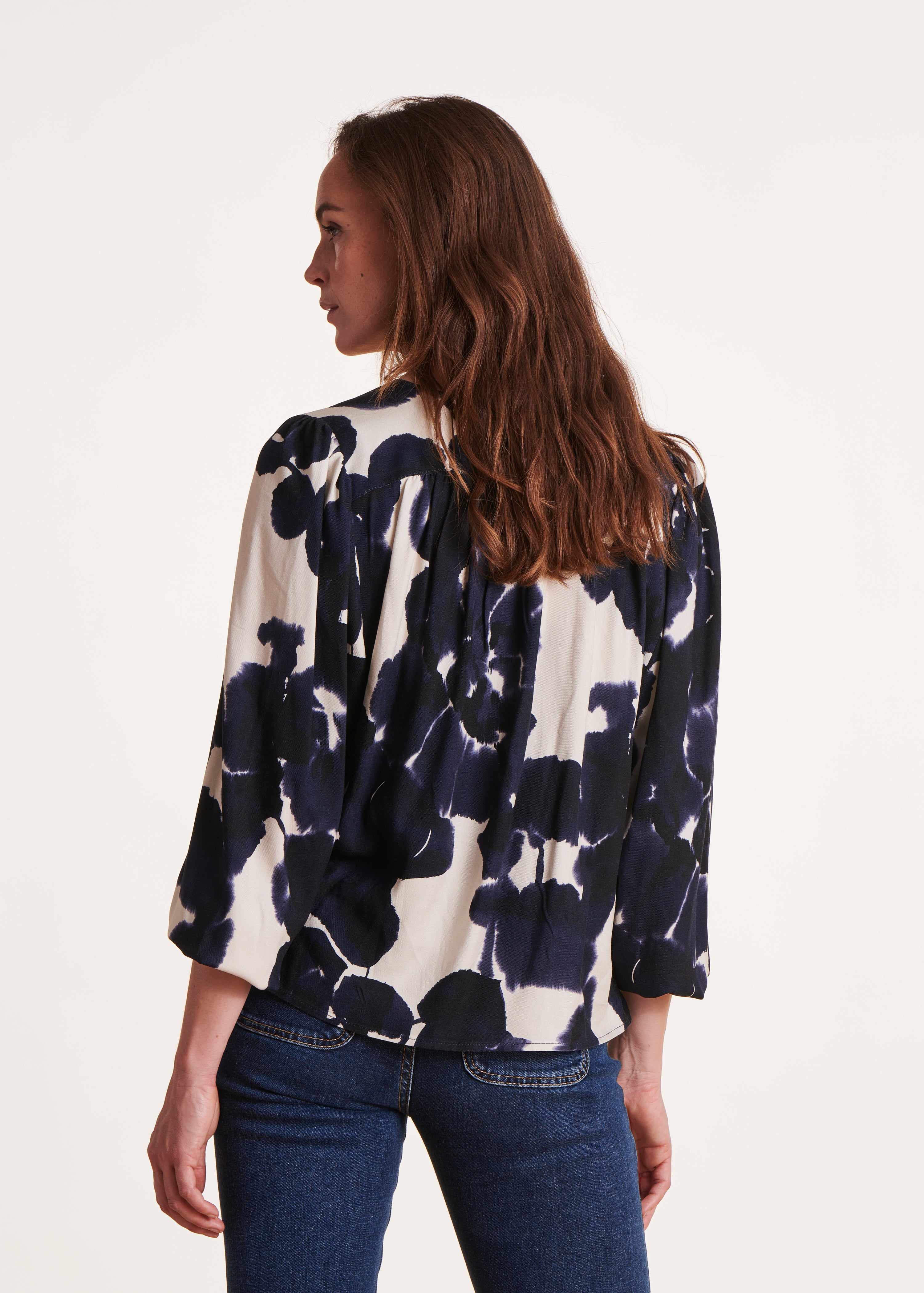 Blue floral printed V-neck blouse