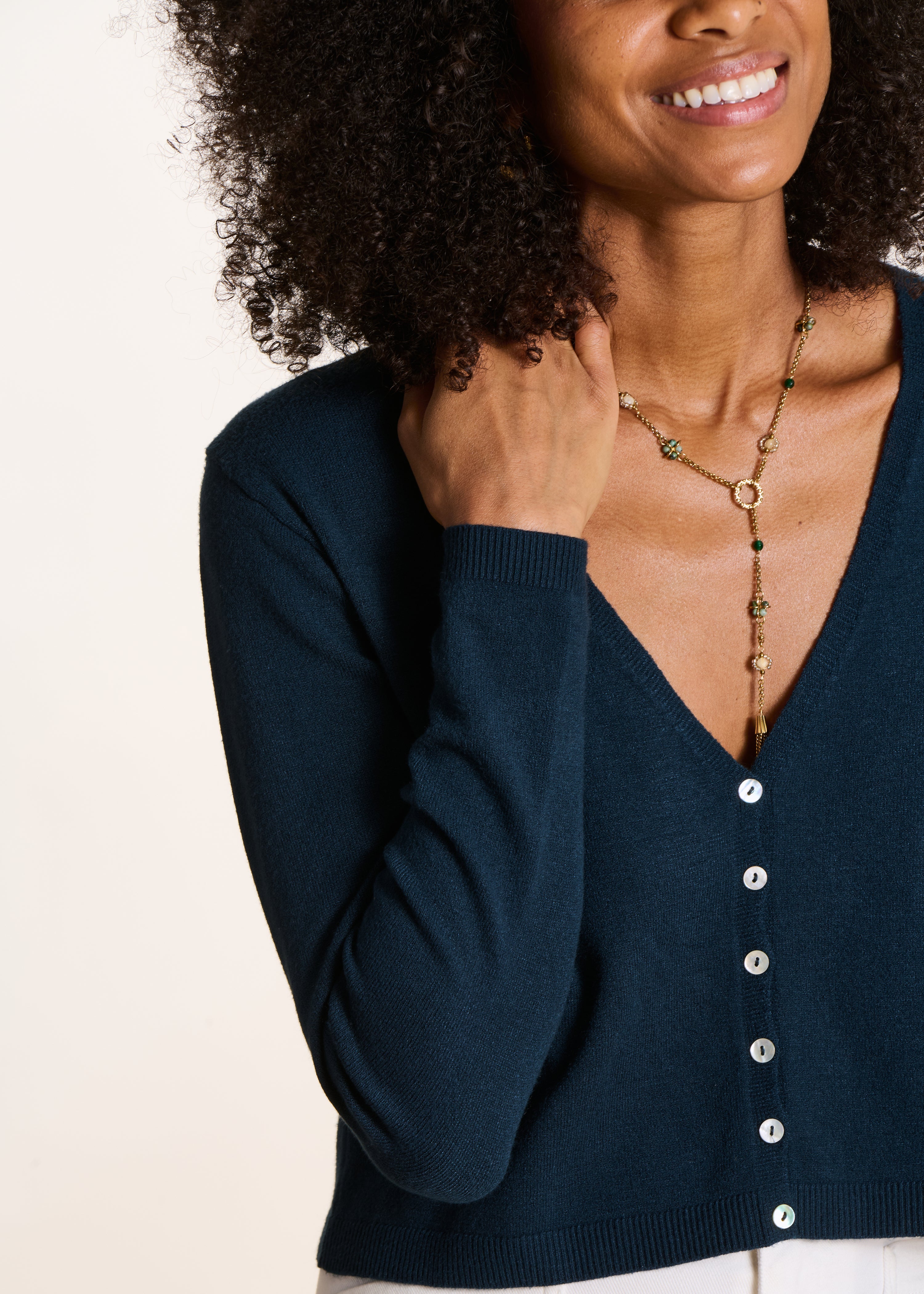 Gilet bleu pétrole court encolure V