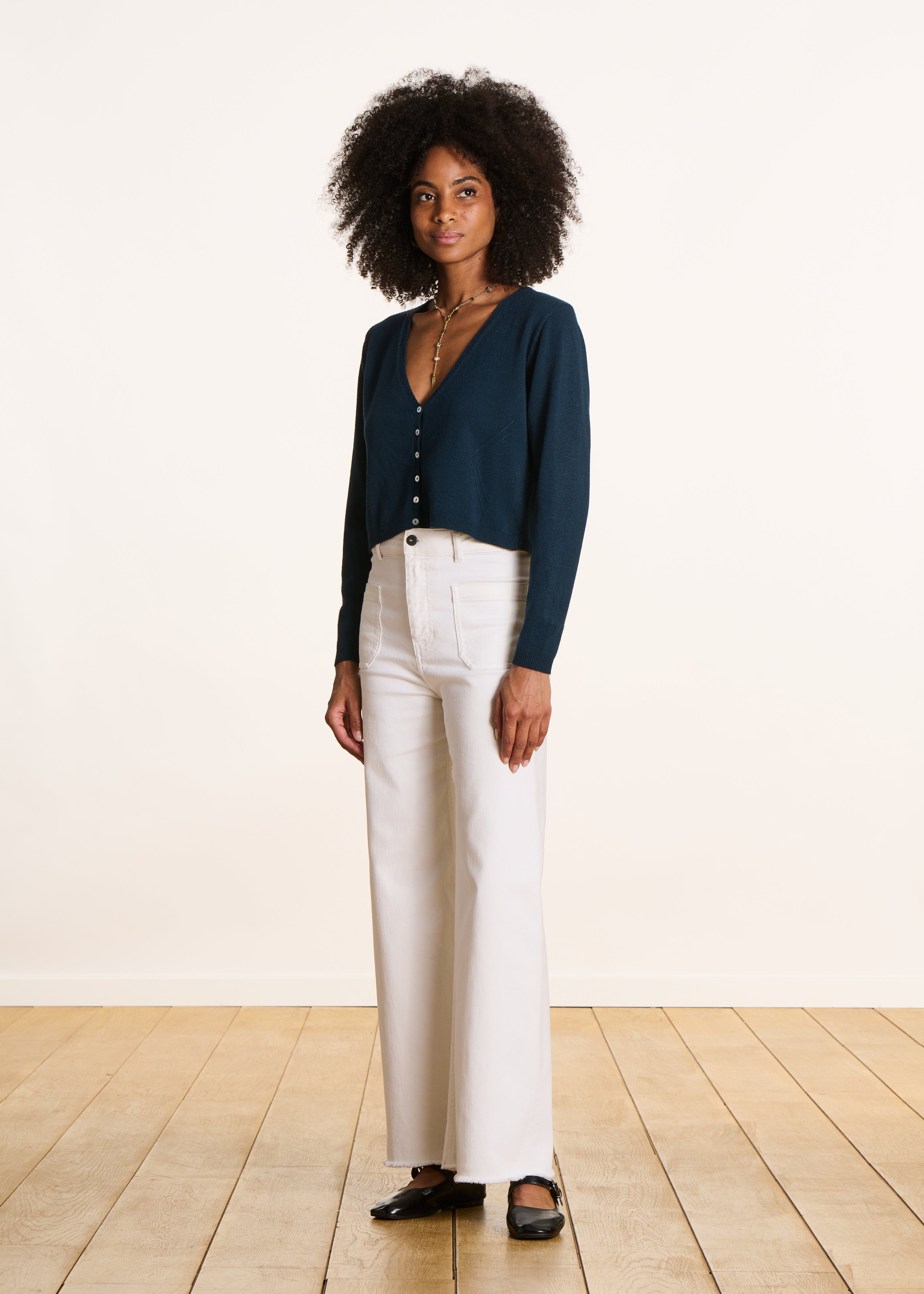 Gilet bleu pétrole court encolure V