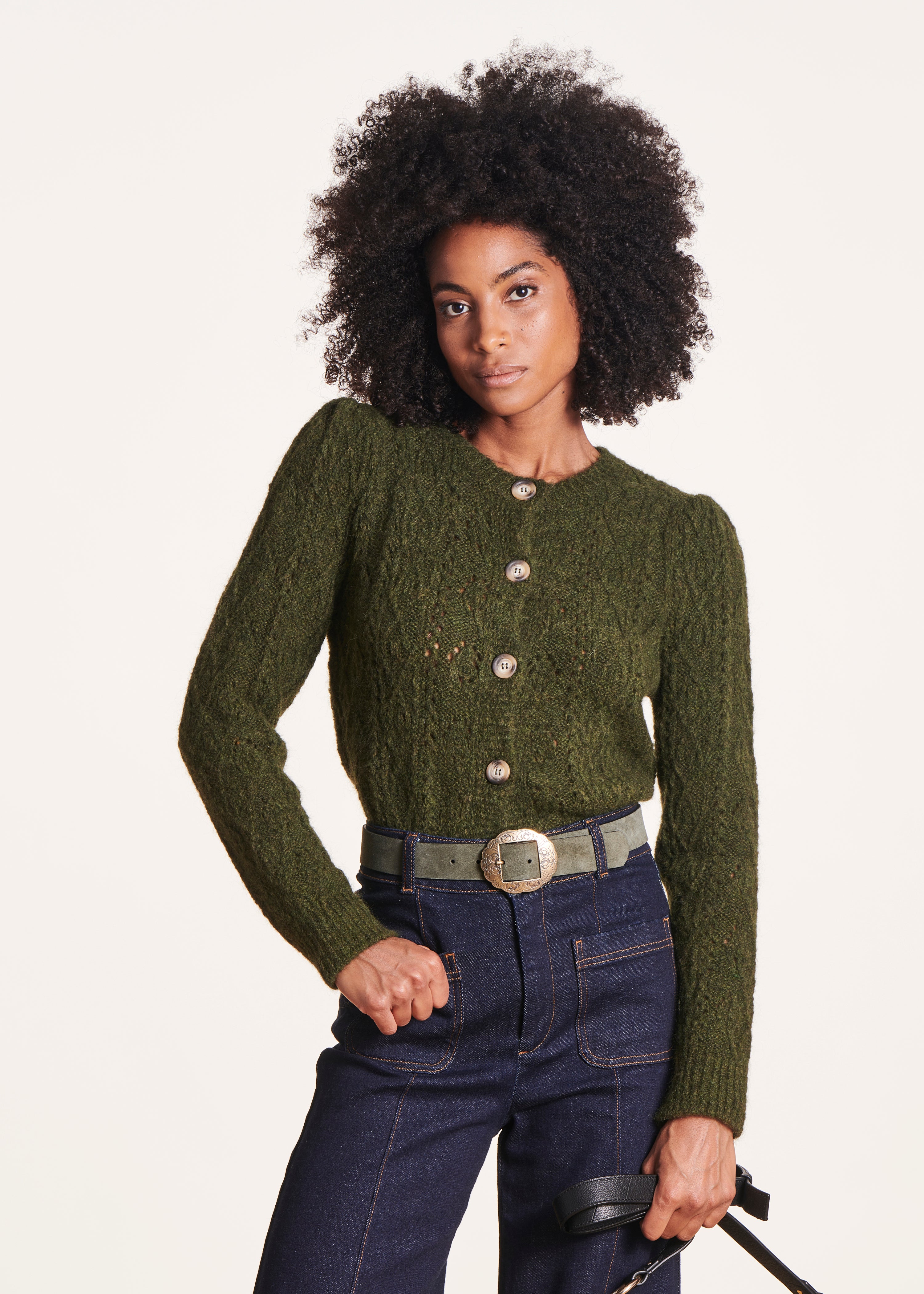 Green cardigan with round neckline and long sleeves