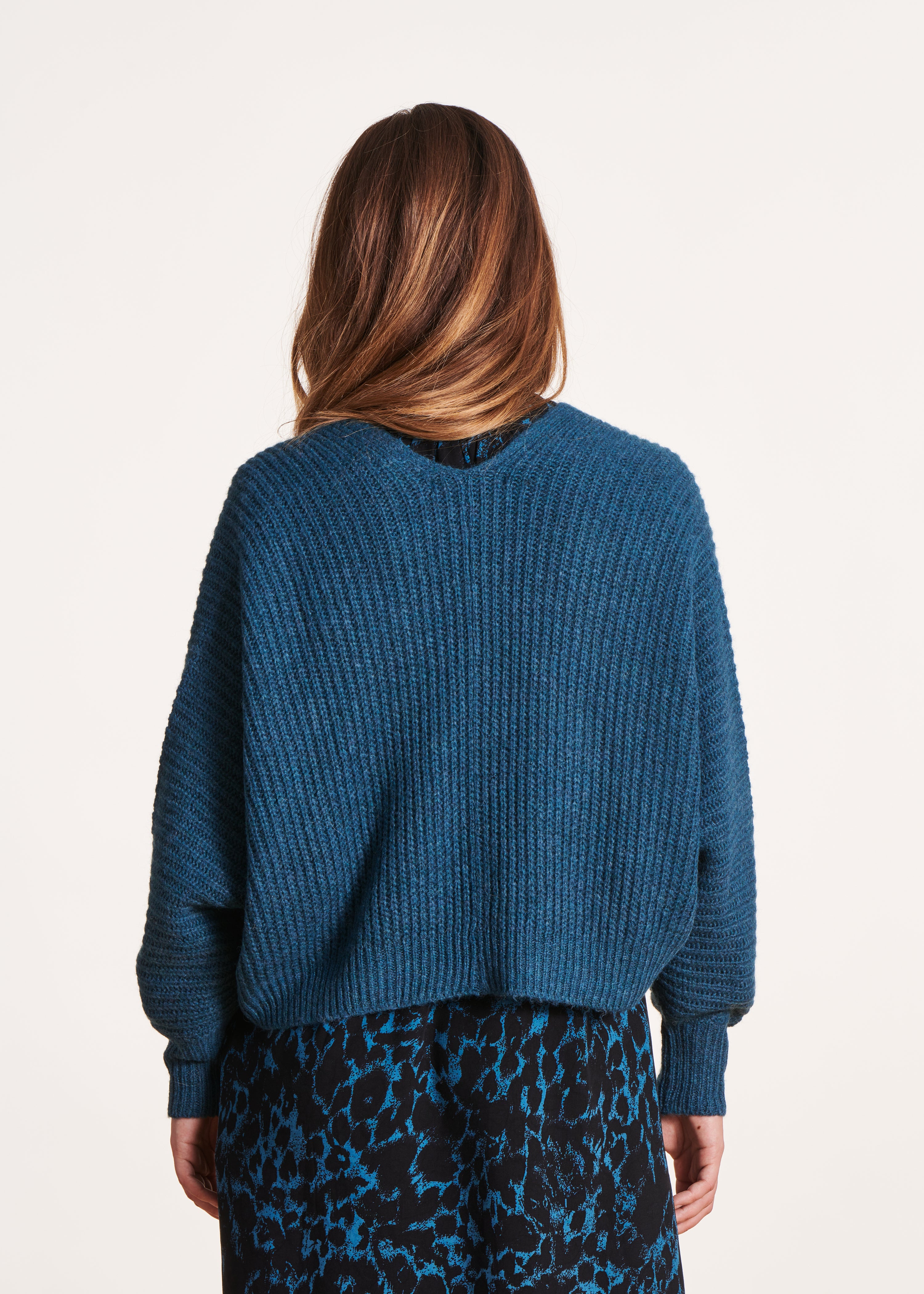 Short, open petrol blue cardigan with batwing sleeves