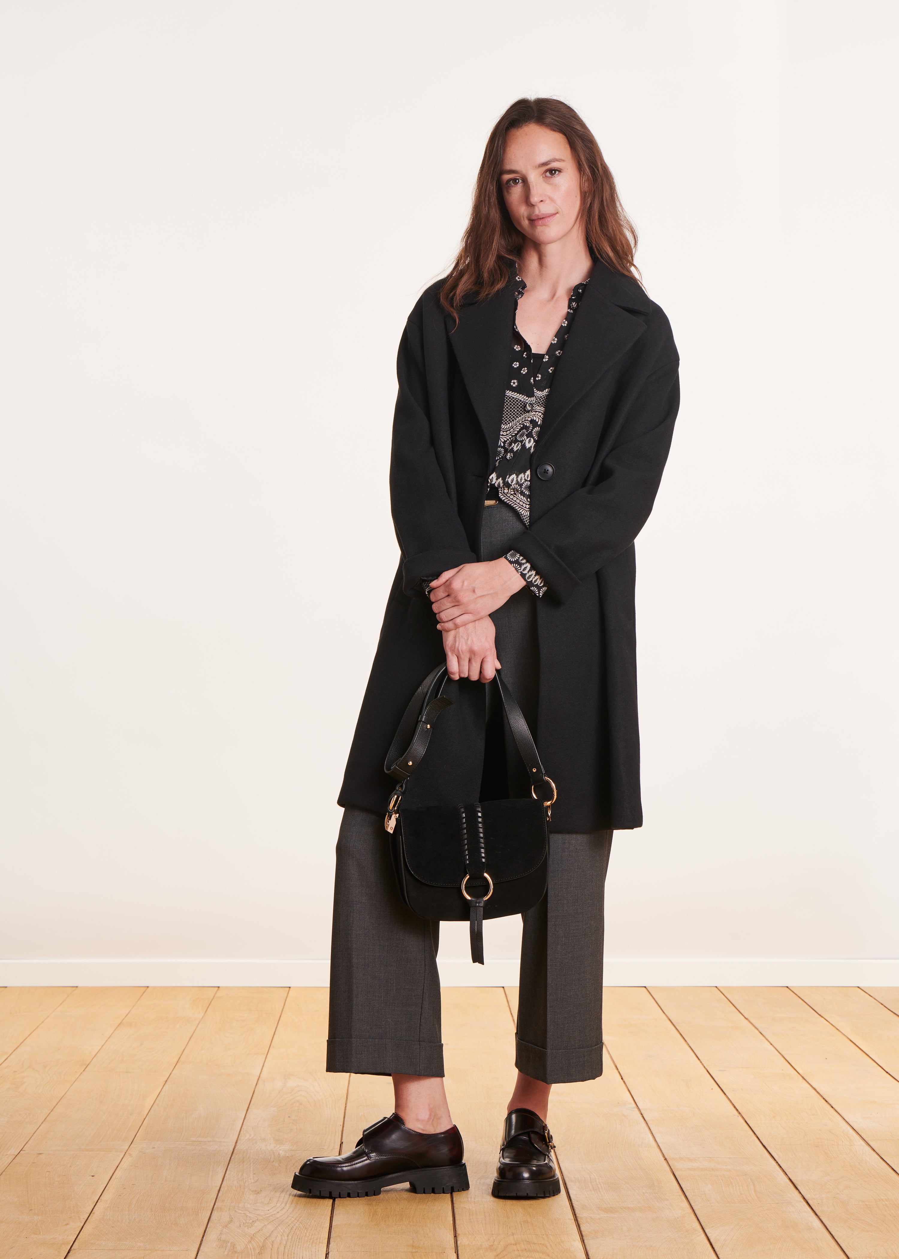 Manteau mi-long noir coupe ample