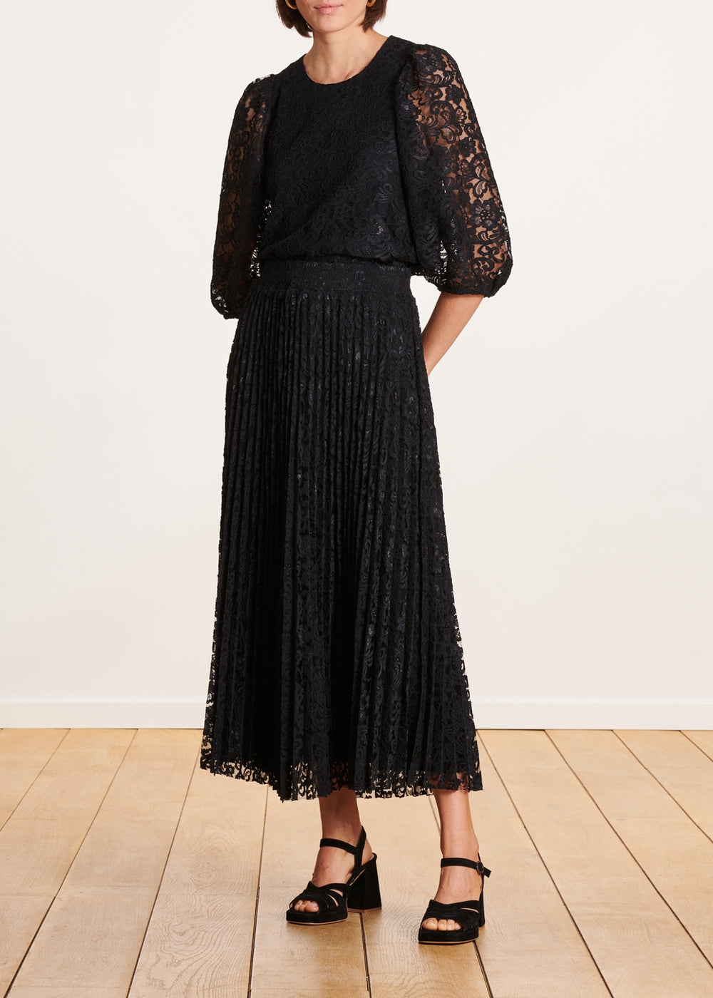 Falda midi plisada negra