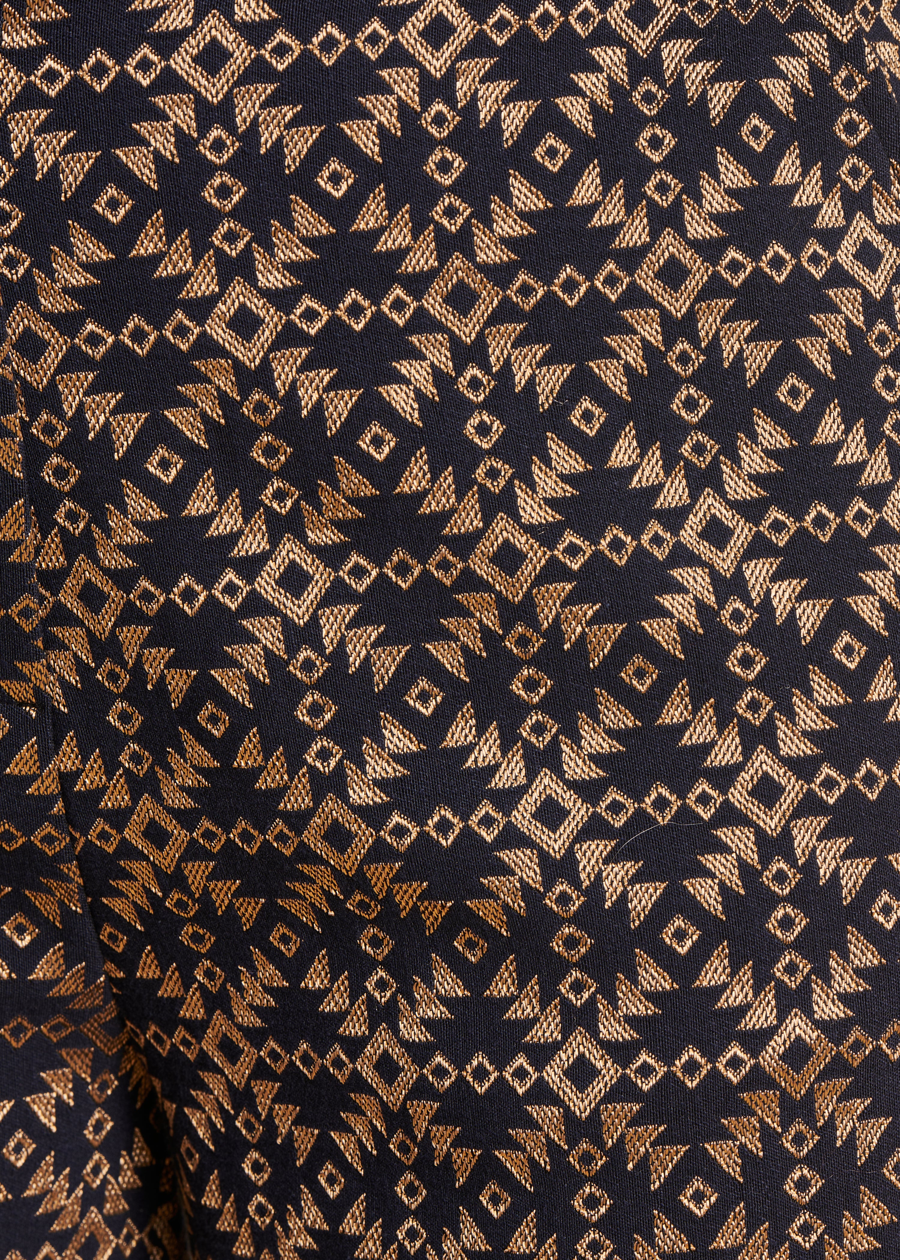 Calças de perna direita 7/8 em jacquard preto e dourado