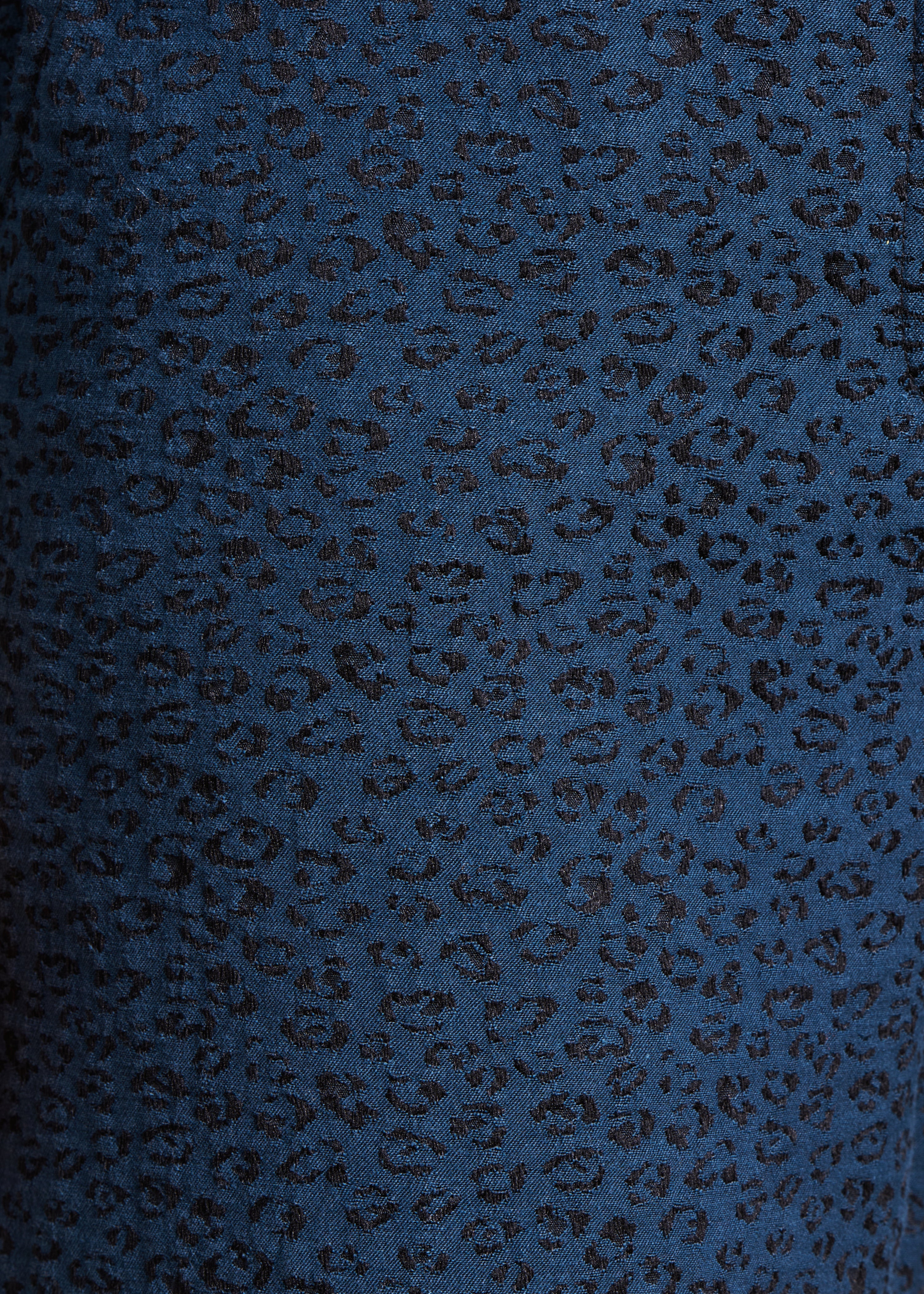 Calças largas em jacquard preto e azul