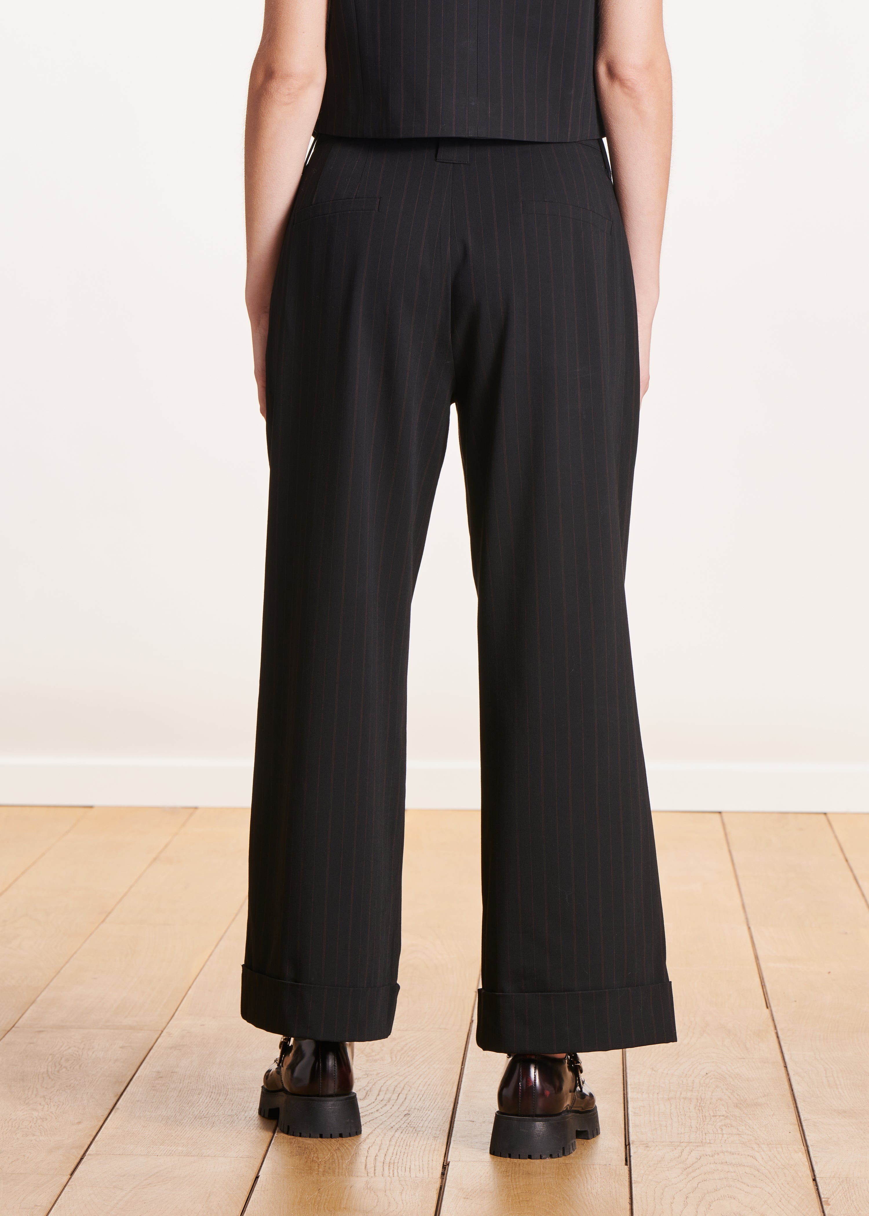 black high-waisted trousers