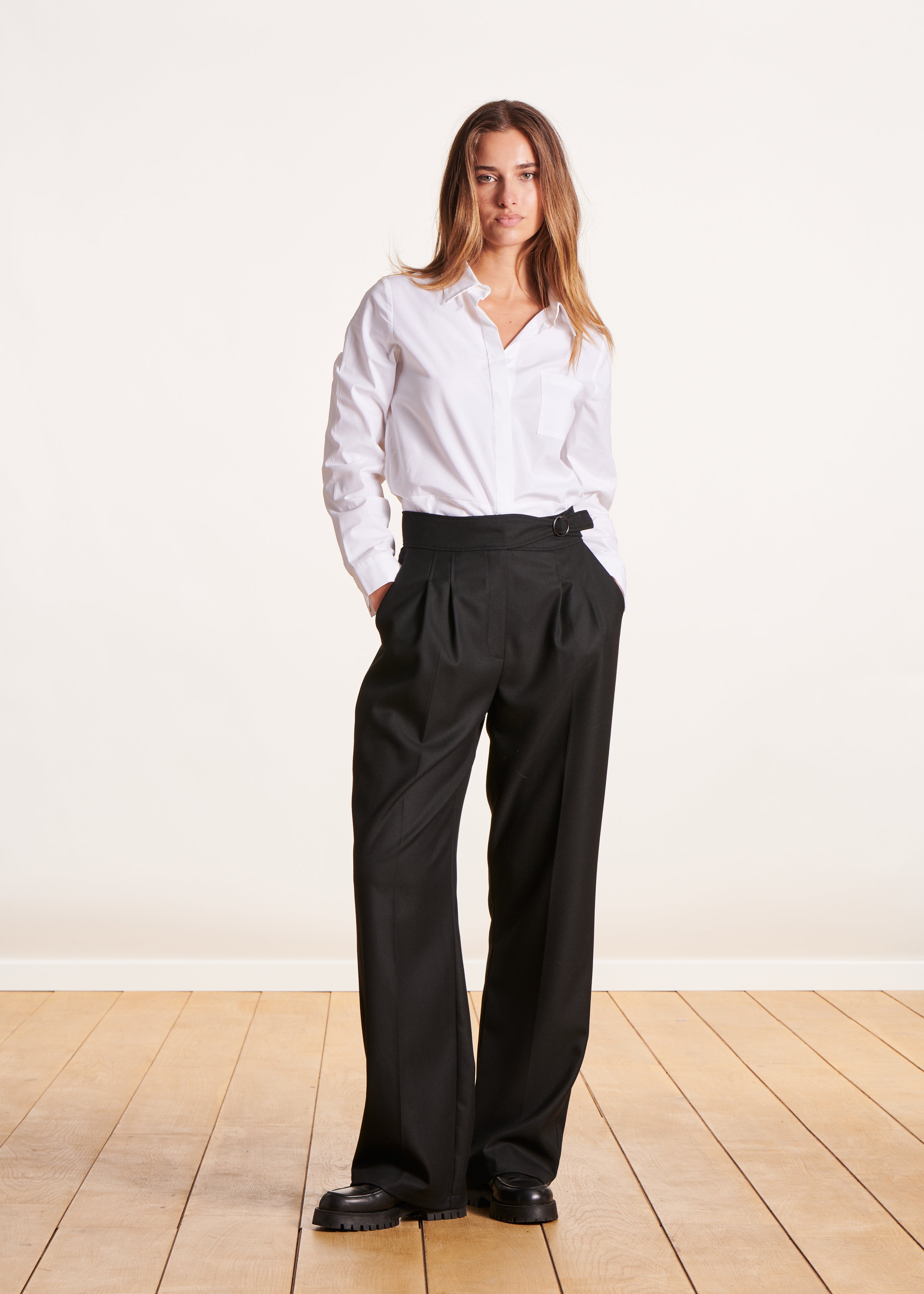 black pants with wide fancy belt