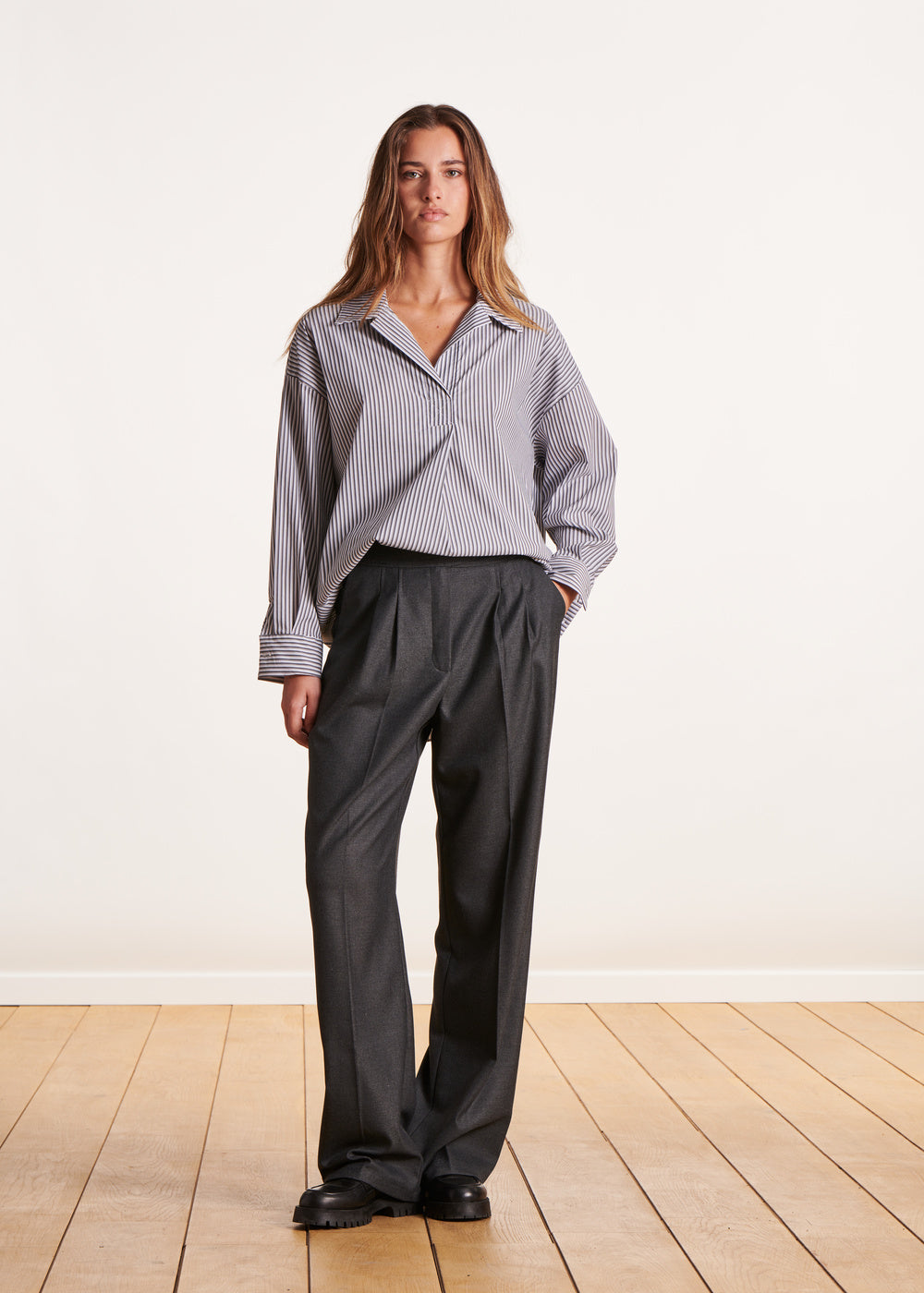 Anthracite gray pants with wide fancy belt