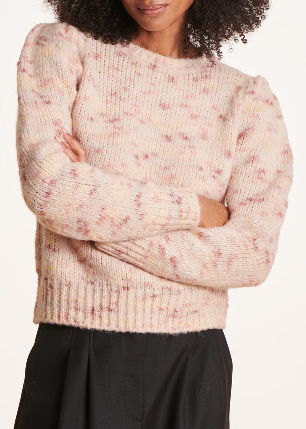 Pale pink fitted sweater with round neckline
