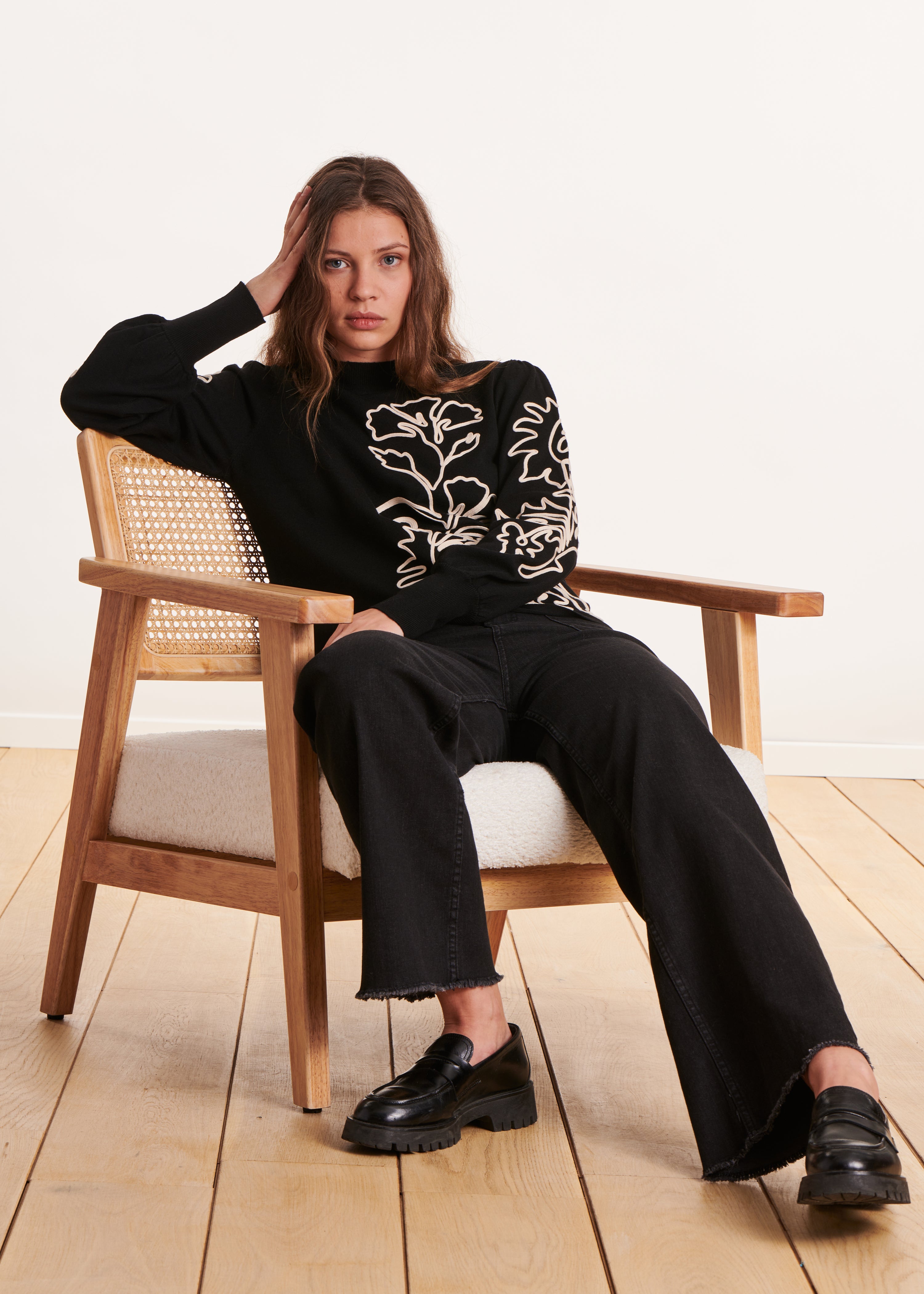 black fine knit sweater with flower embroidery